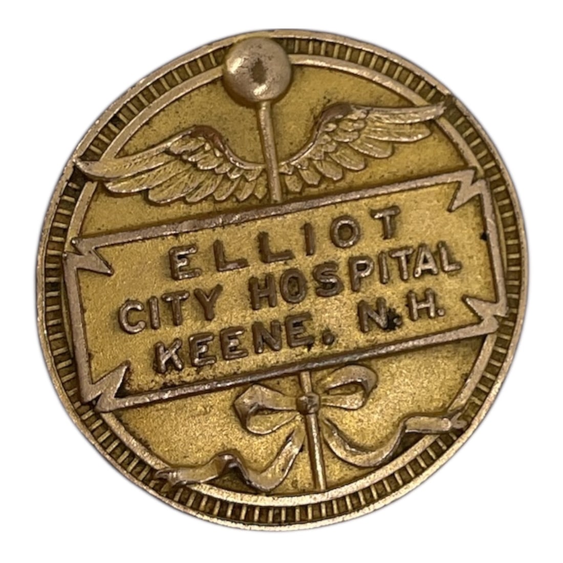 Elliot City Hospital Keene NH Nurses Training School Badge 1916 Fannie TM Green: Antique nurses training school badge from Elliot City Hospital in Keene, New Hampshire, dated 1916. This detailed piece features medical symbolism on the front, including staff and wings, with engrave