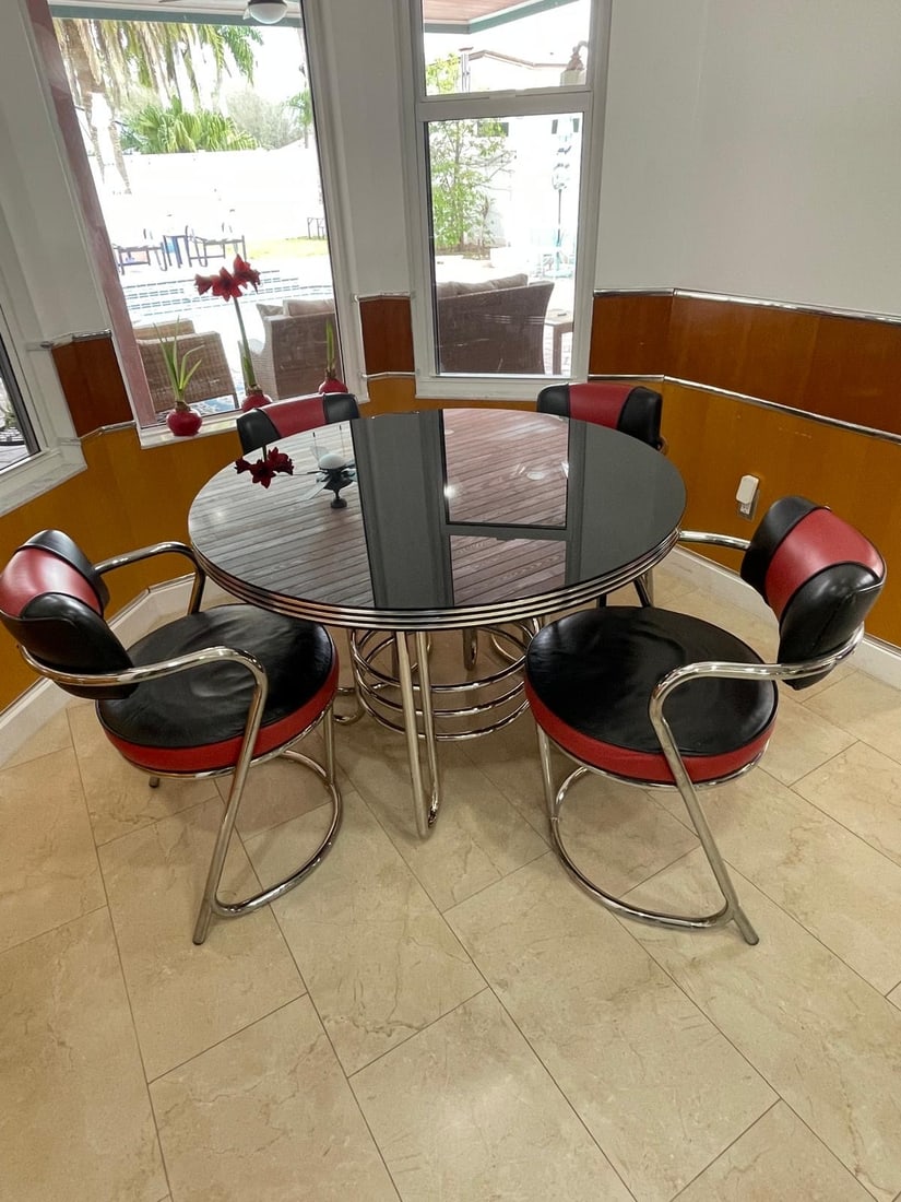 Stunning Mid-Century Hollywood Regency Style Chrome & Vinyl Dining Set (Circa 1960s/70s): DescriptionThis is a beautiful and iconic mid-century 5-piece dinette set, capturing the classic 1950s diner or 1970s Art Deco Revival style. The set includes a round dining table with a