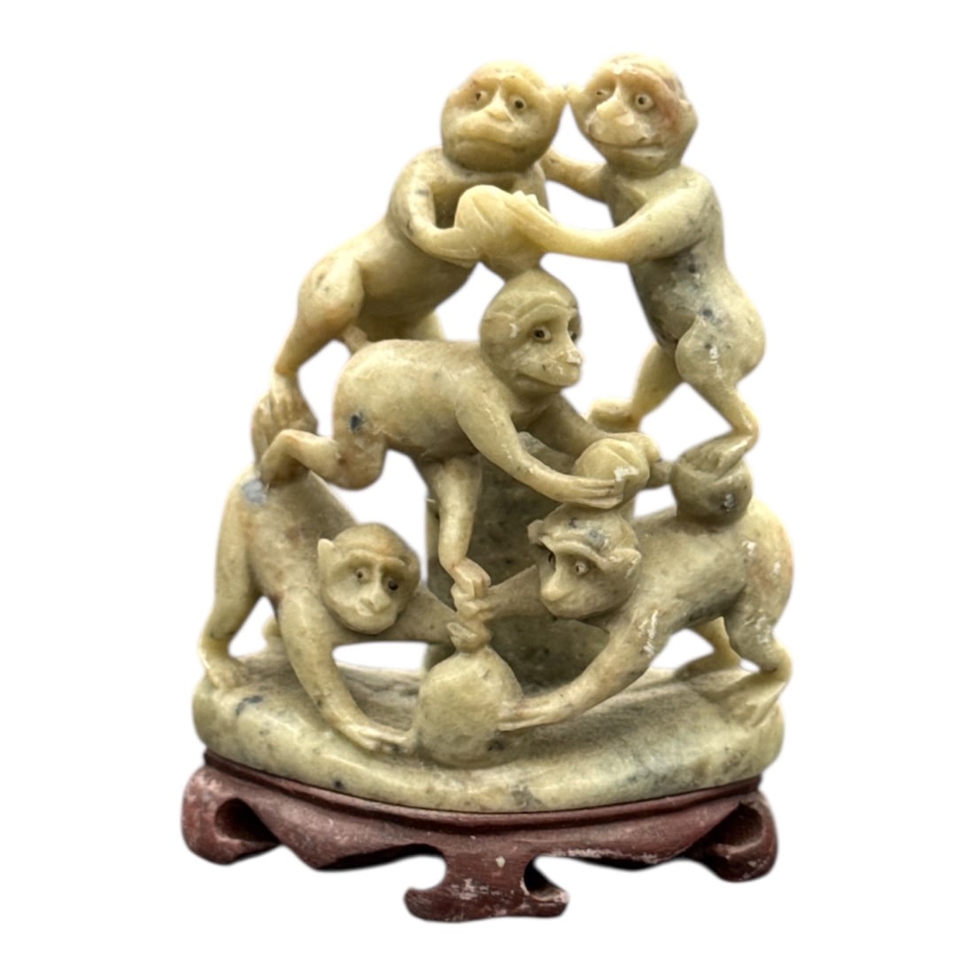 Carved Stone Monkey Group Sculpture: Carved stone sculpture depicting