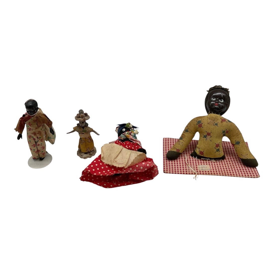 Collection of Vintage Black Americana Cloth and Composition Dolls, 20th Century: A small collection of vintage dolls featuring