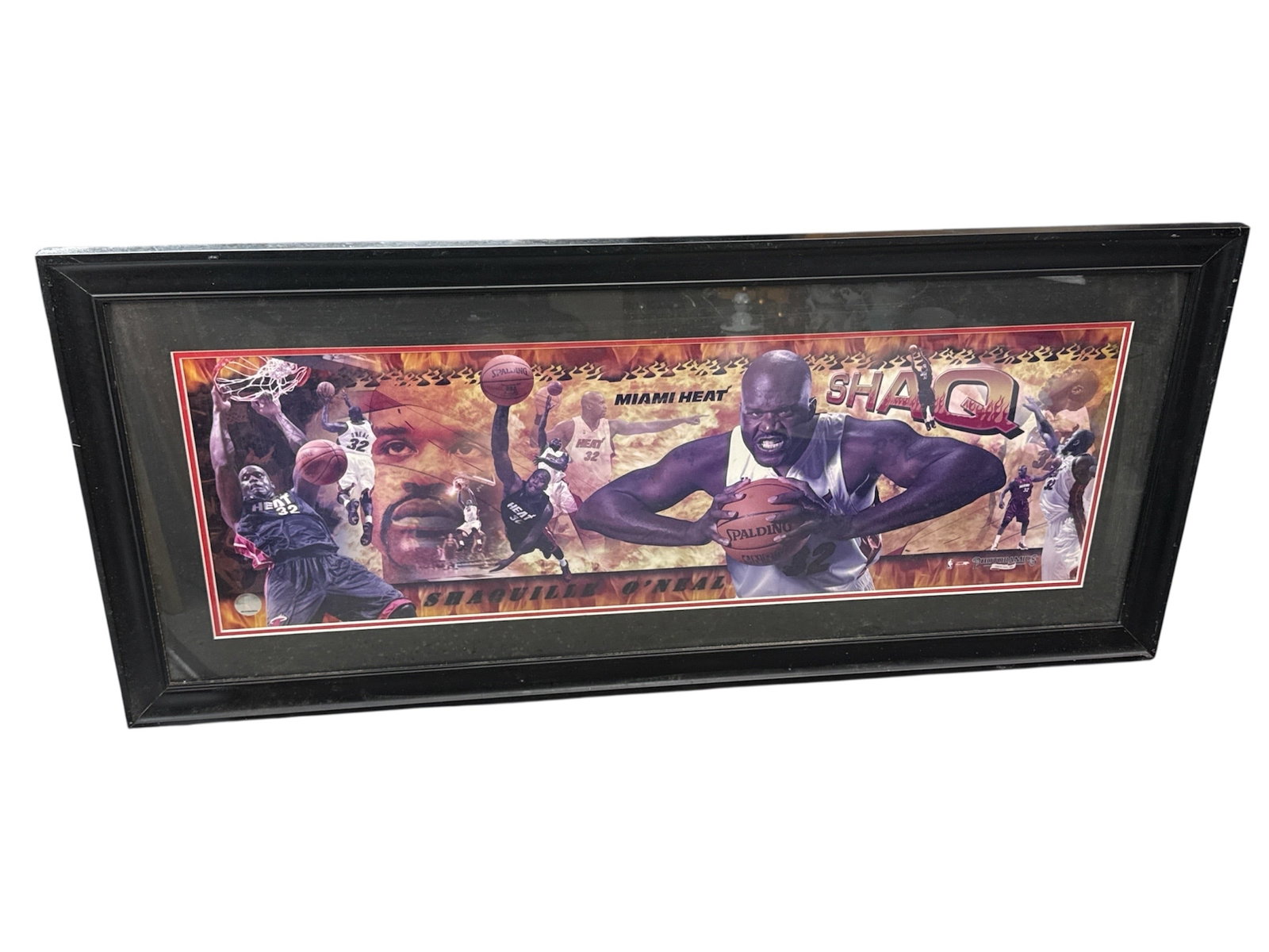 Framed Shaquille ONeal Miami Heat NBA Photo Collage Print: Dynamic framed sports print featuring NBA superstar Shaquille O’Neal during his time with the Miami Heat. The vibrant collage design showcases Shaq in action with bold team graphics and energeti