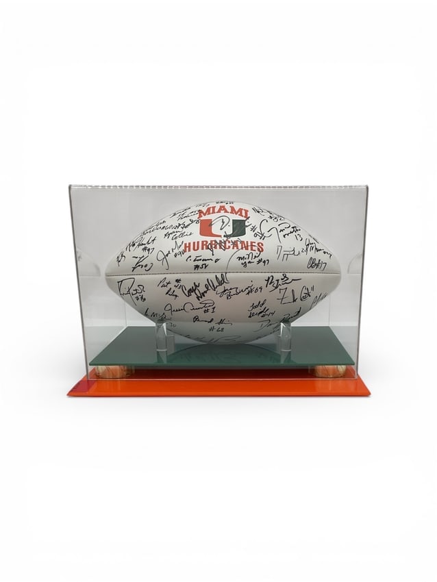 1991 Miami Hurricanes Team-Signed Football with Letter of Authenticity: Official Miami Hurricanes football signed by members of the legendary 1991 National Championship team, widely regarded as one of the greatest teams in college footbal