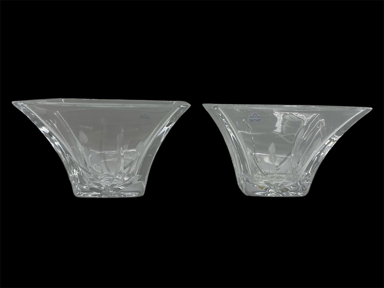 Pair of Modern Clear Art Glass Centerpiece Bowls: A pair of modern clear art glass bowls featuring a flared square form with sculptural lines and faceted bases. Each bowl displays clean, contemporary styling with thick glass construction and geometri
