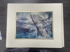 Small print: This is a limited-edition print depicting a humpback whale breaching the ocean's surface, with a small boat visible in the background by Robert Zwickel Medium: Watercolor 