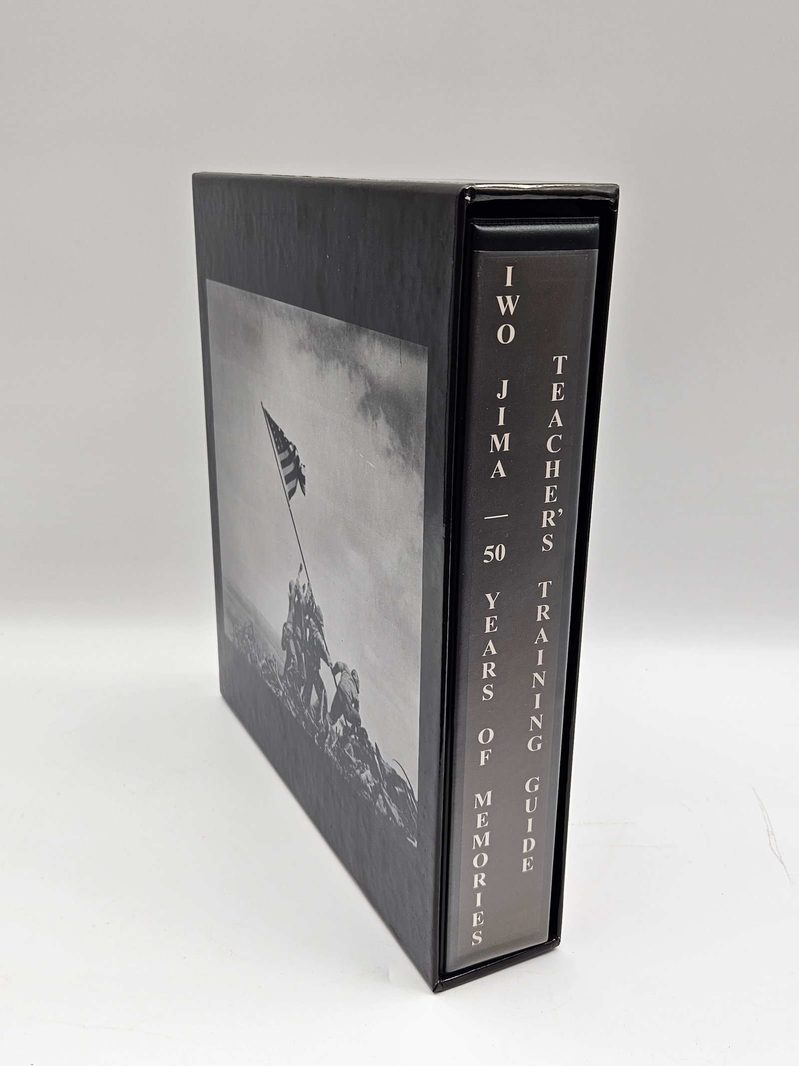 Iwo Jima: 19 Years of Memory Teachers Training College Video: Iwo Jima: 19 Years of Memory Teachers Training College video. The video comes in a black case with a black and white image of the flag raising on Iwo Jima. Also includes a World War II Chronicles Iwo