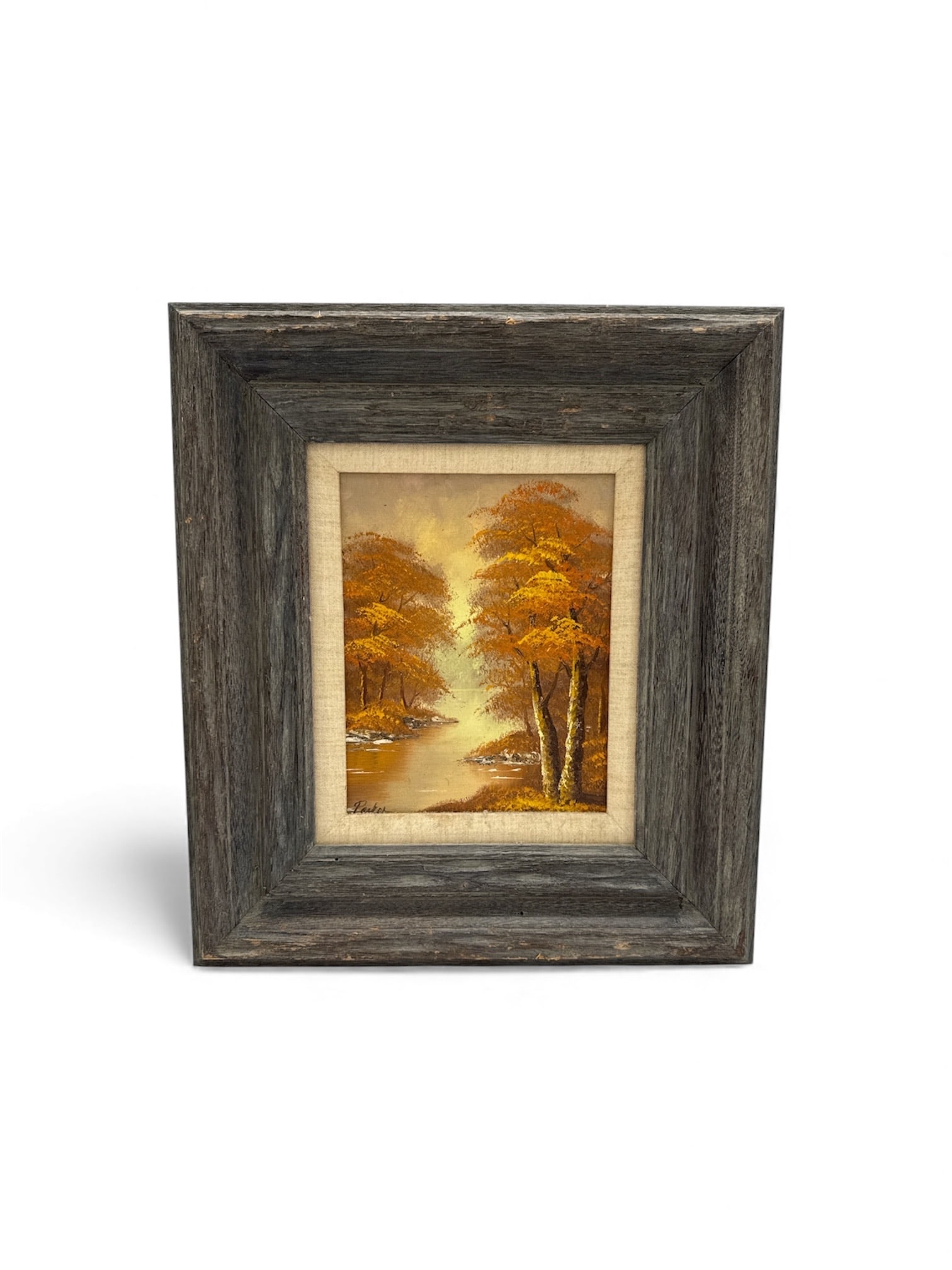 Autumn Landscape Painting: Description: painting depicting an autumn landscape with trees and a river. Signed lower left "Parker". Medium: Oil on canvas Dimensions: H:18in L:16.5in