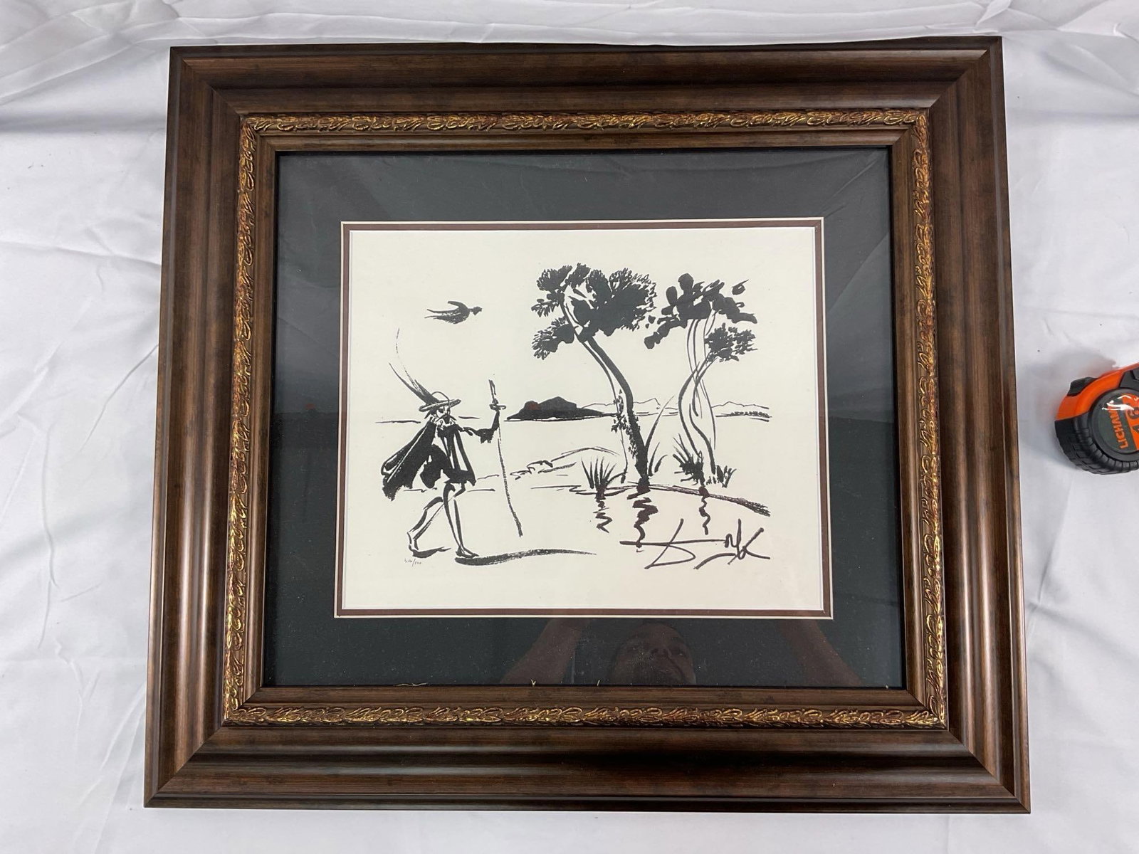 Salvador Dalí Don Quixote L.E Etching w/ Papers:  Salvador Dali limited edition 306/500 titled "Transportation suite man with a walking stick". Includes COA. Medium: Etching Dimensions: H:23in L:25in approx