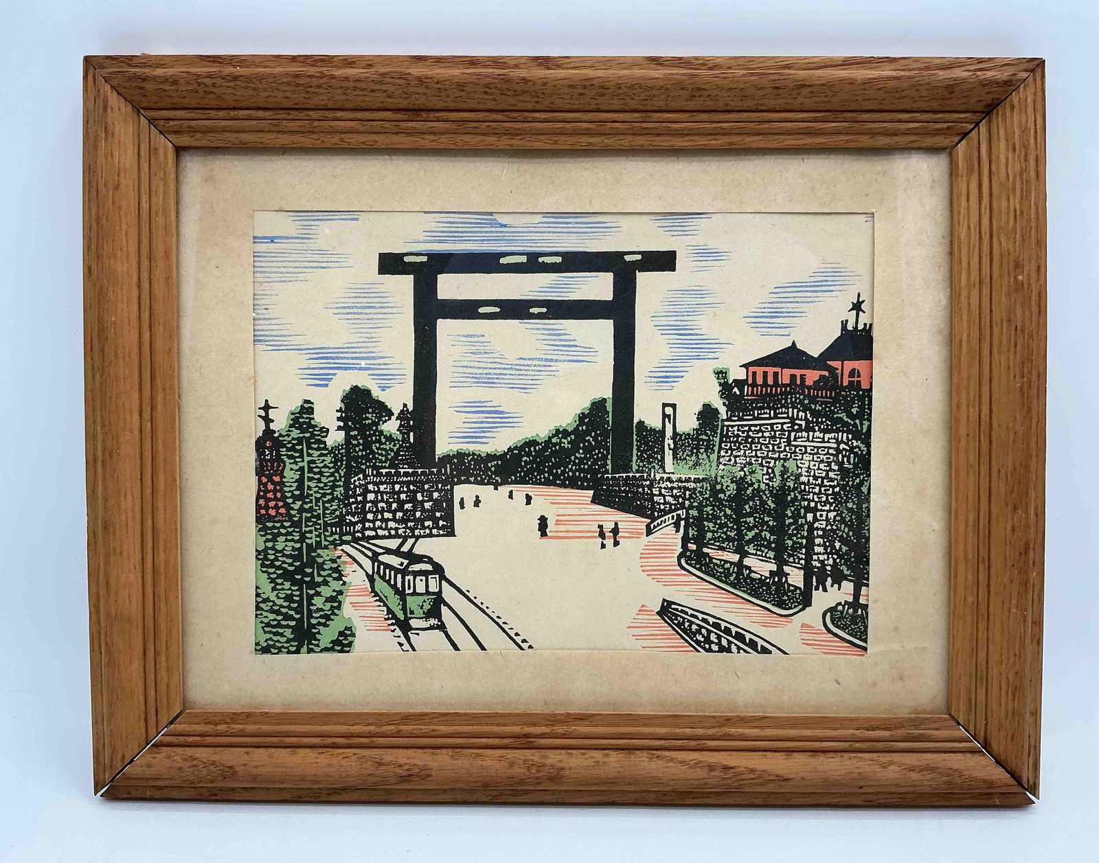 "Torii of Kudan" by Kawakami Sumio (Japan,1895–1972) Woodblock: Color print depicting a traditional Japanese torii gate overlooking a river with surrounding village architecture and trees. Framed in light wood under glass. Medium: Woodblock Dimensions: H:11