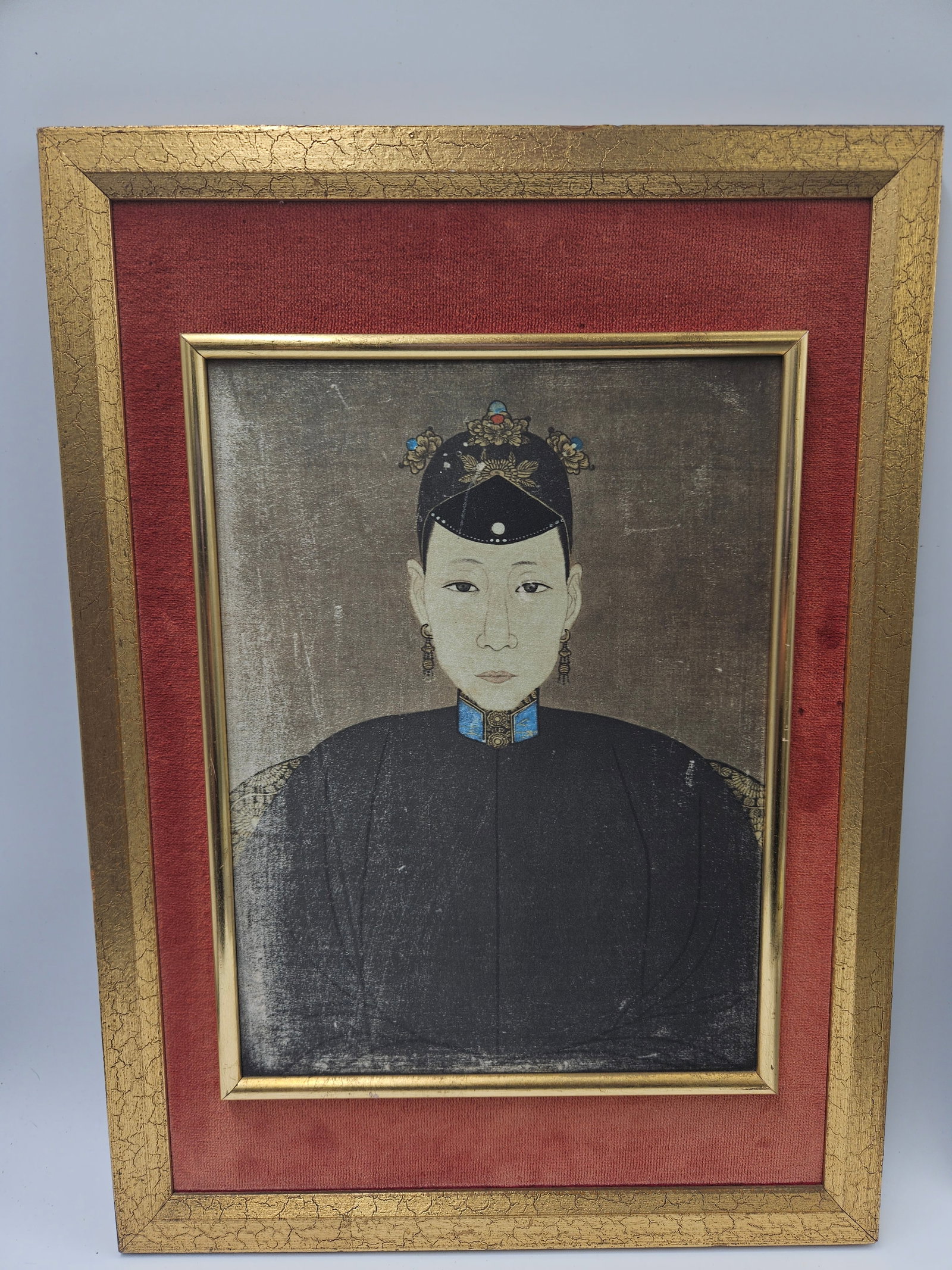 Antique Chinese Ancestral Portrait of a Young Noble: Finely rendered Chinese ancestral portrait depicting a young noble or scholar dressed in traditional formal attire with an ornate headdress. Painted in muted tones with delicate facial detailing, the