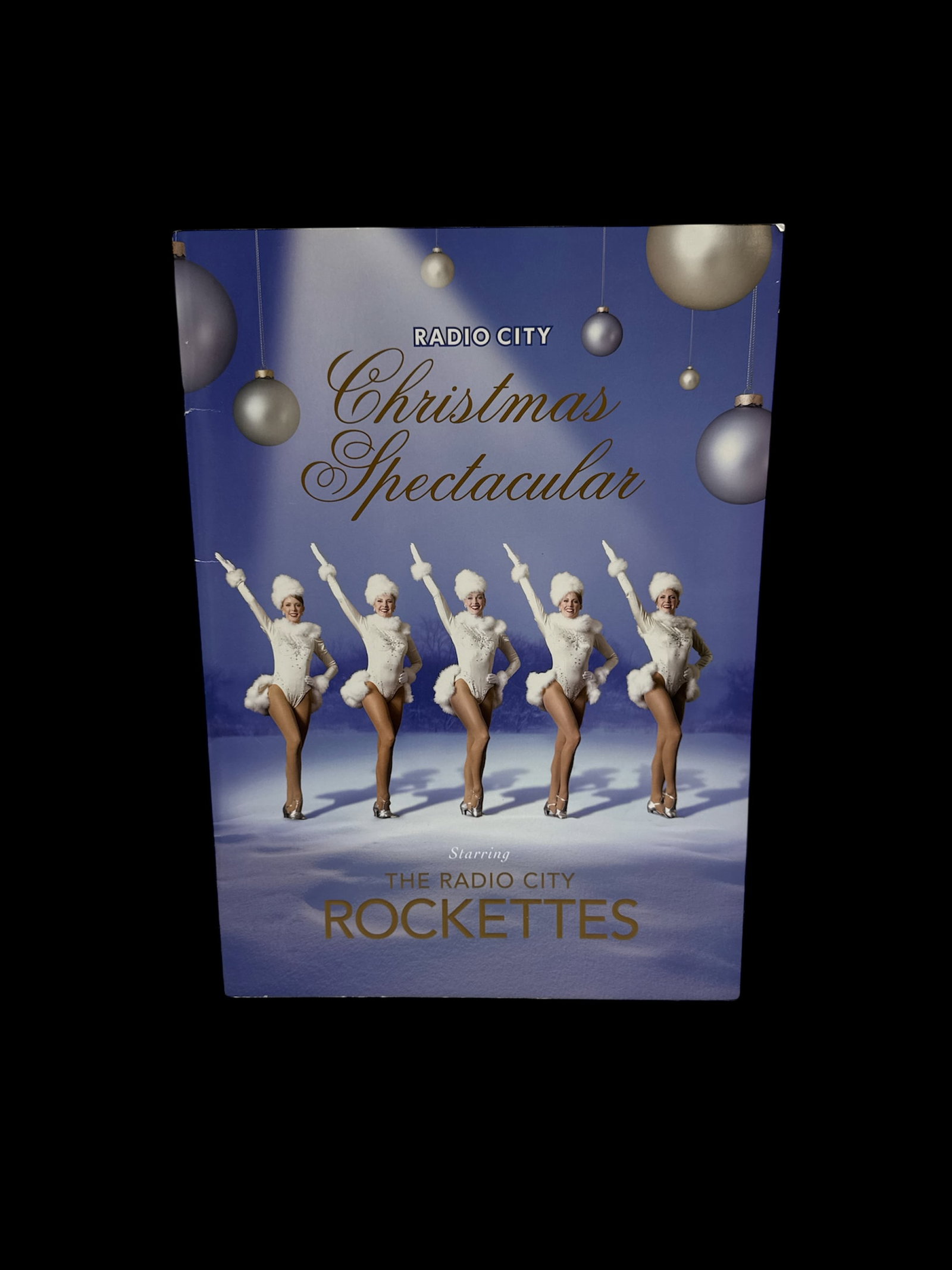 Radio City Christmas Spectacular Book: Radio City Christmas Spectacular book featuring the Rockettes. Dimensions approximately 15 x 11 inches.