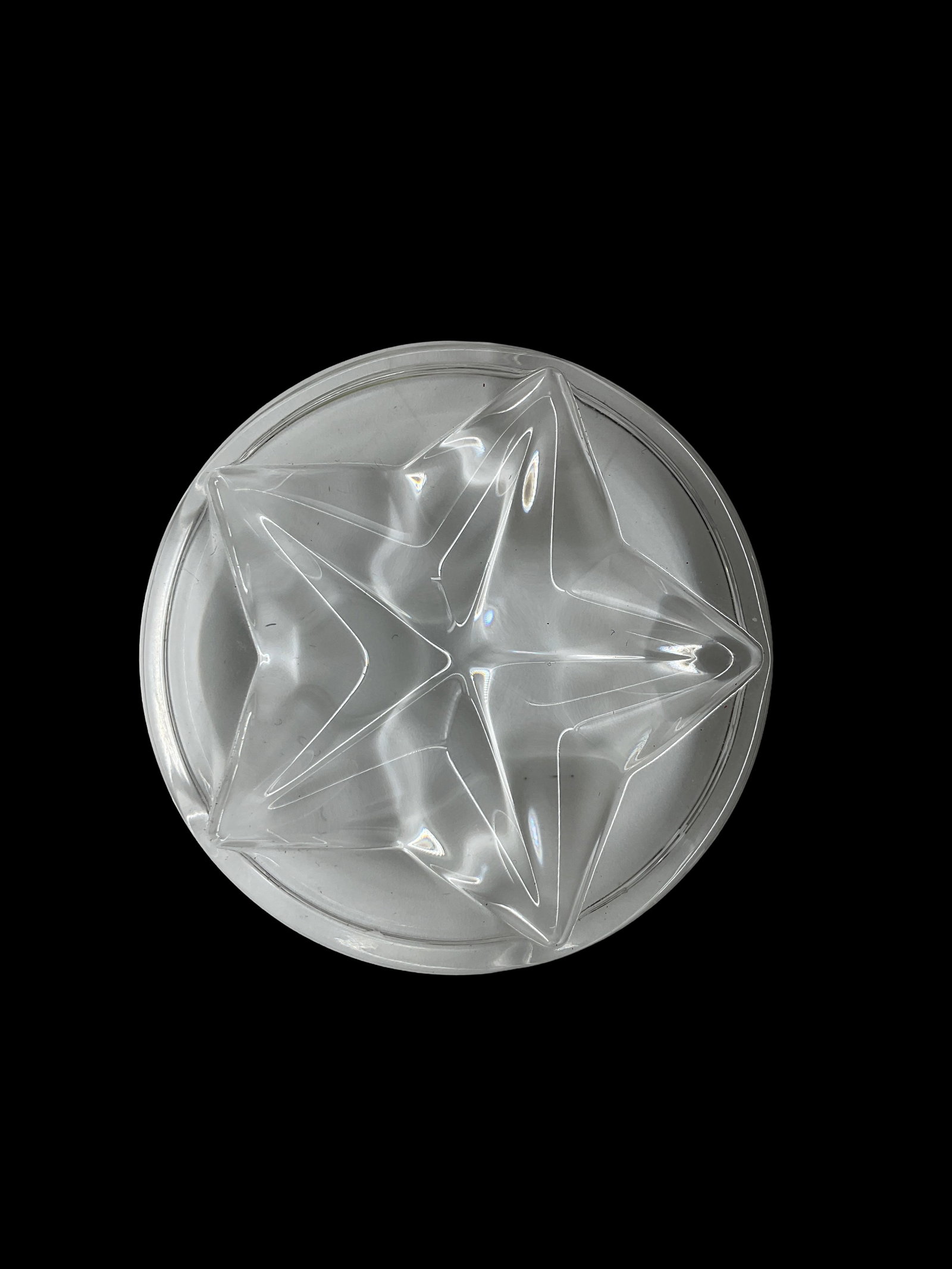 Steuben Crystal Star Paperweight / Hand Cooler: Clear Steuben crystal paperweight featuring a sharply sculpted five-point star in relief. Exceptional clarity and precision cutting highlight the iconic Steuben quality, making it an elegant decorativ