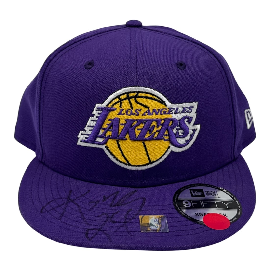 Kobe Bryant Autographed Los Angeles Lakers Hat: This Los Angeles Lakers New Era 9FIFTY snapback cap features a hand-signed autograph by Kobe Bryant in black permanent marker across the brim. The hat is constructed from purple polyester with an embr
