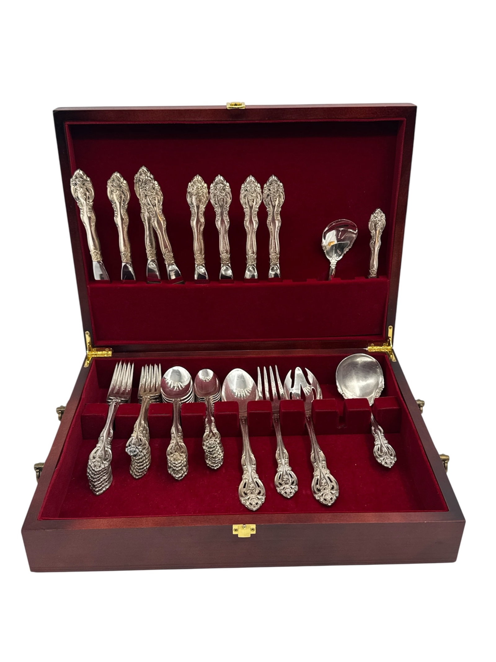 Gorham Sterling Silver Flatware Service in Melrose Pattern: A comprehensive sterling silver flatware service by Gorham in the ornate Melrose pattern, featuring deeply carved rose and leaf motifs with scrolled edges. This set includes service for eight with var