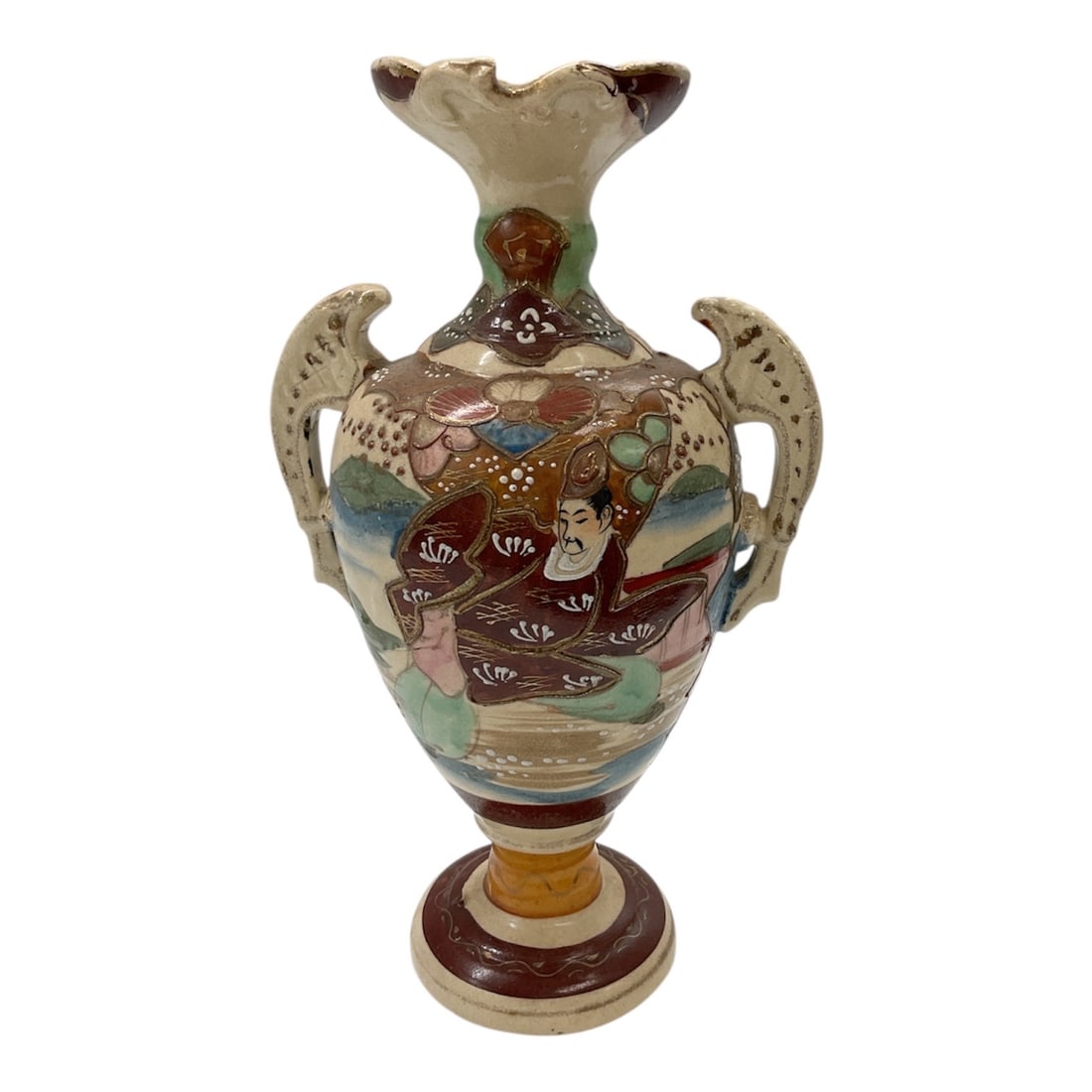 Satsuma Style Porcelain Double-Handled Vase: This porcelain vase features a baluster-form body with a flared, scalloped rim and two stylized side handles. The surface is decorated in the Satsuma style, showcasing detailed figural scenes of robed