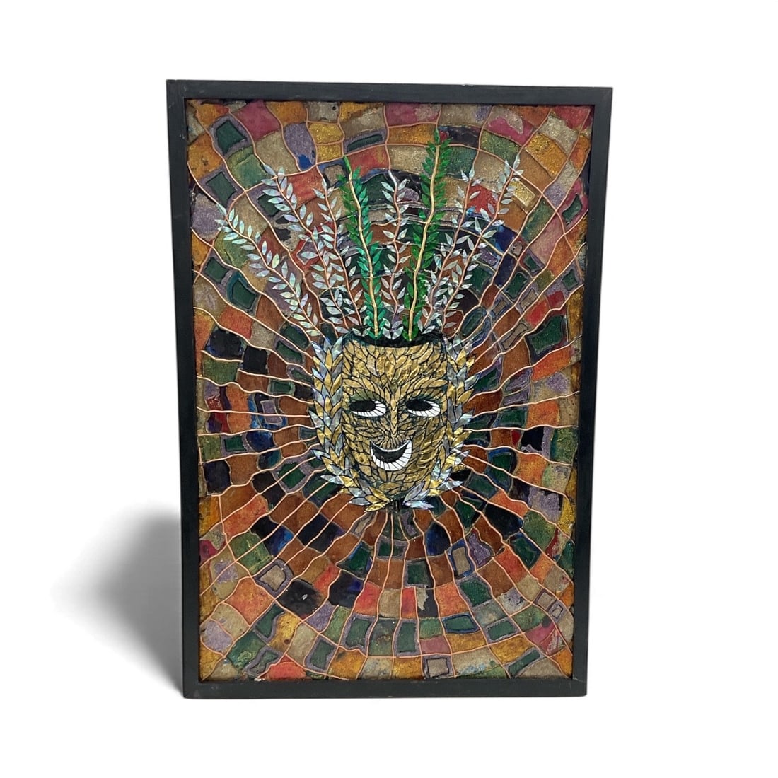 Manolo Nunez – Mosaic Mask with Foliage: Intricate mixed media composition featuring a stylized mask surrounded by radiating mosaic-style blocks and topped with leafy botanical elements, reflecting the signature vibrant aesthetic of Cuban