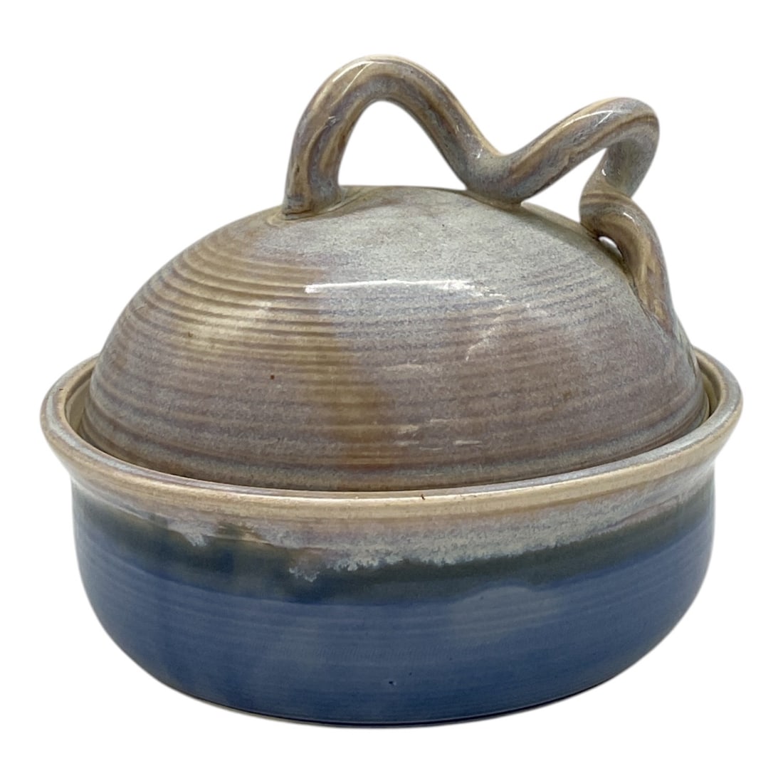 Lidded Blue Glazed Pottery Dish, Signed: Pottery dish with fitted domed lid featuring an applied loop handle. Decorated in layered blue and earth-tone glazes with visible throwing rings and organic variation. Underside with incised signature