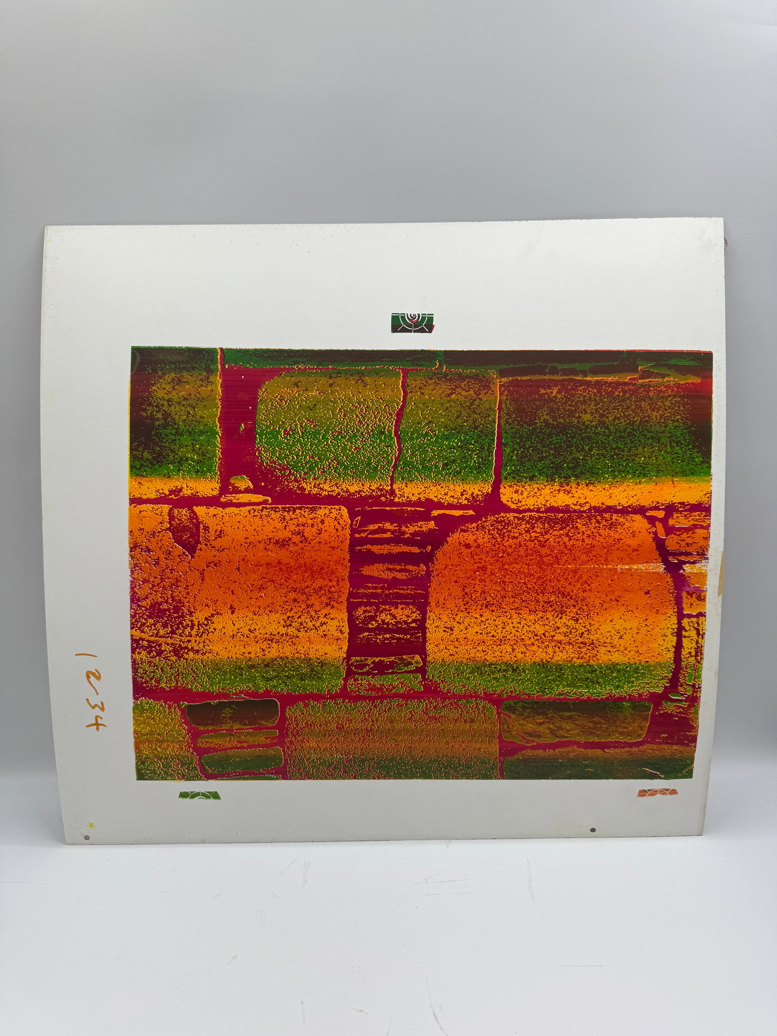 Abstract Print: Abstract print featuring a colorful, geometric design. Dimensions: 30.5 x 29 inches. Unframed.