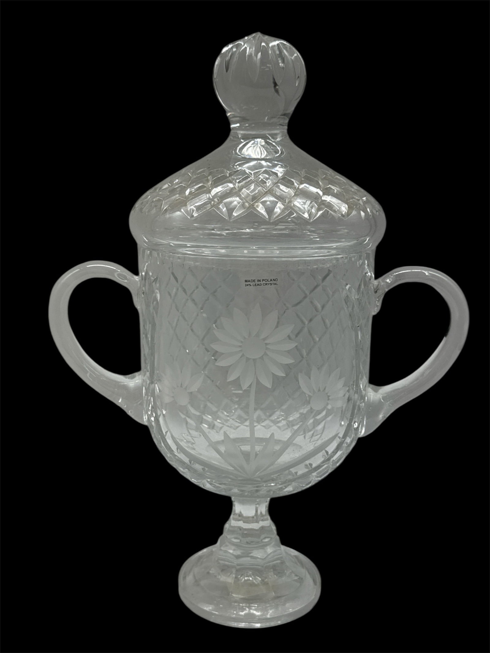 Large Cut Crystal Lidded Trophy Form Urn with Handles: Impressive large cut crystal lidded urn in classic trophy form, featuring dual scroll handles and a domed lid with faceted finial. The body is richly decorated with diamond lattice cutting and a centr