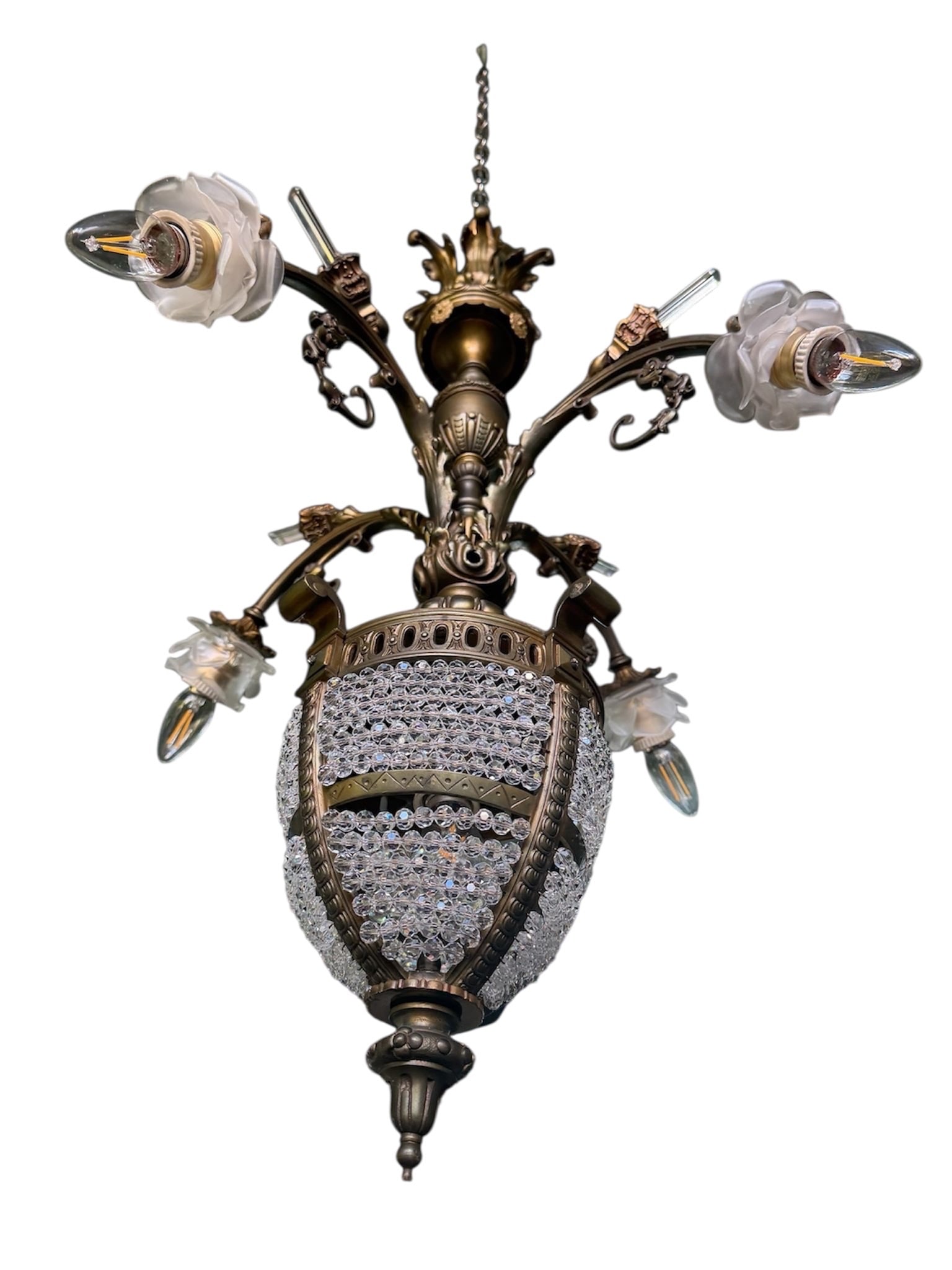Decorative Crystal Globe Chandelier with Brass Tone Mount: This chandelier features a spherical crystal globe composed of faceted glass elements arranged in a geometric pattern and secured within a brass tone metal framework. The globe design creates visual i