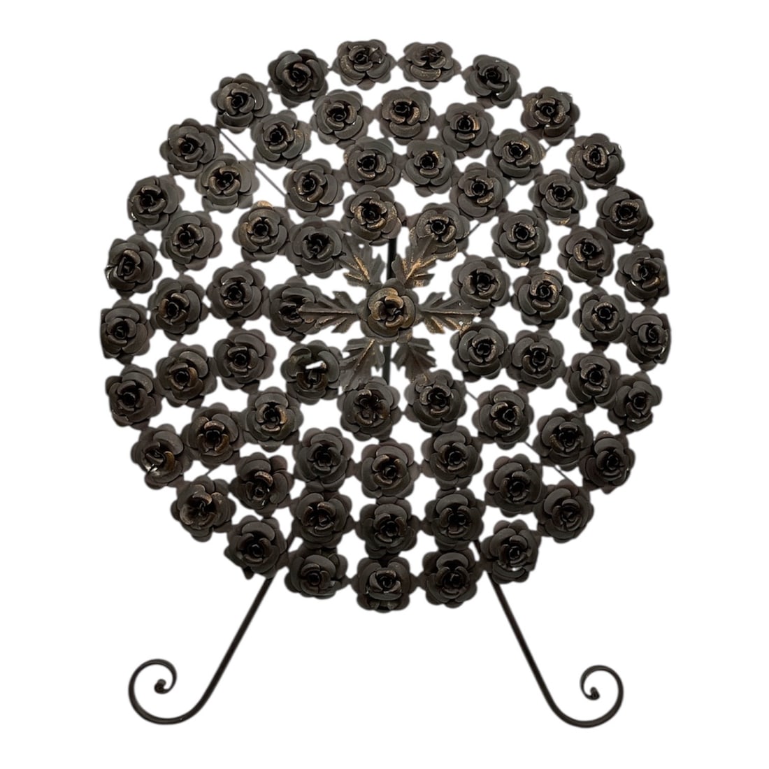 Metal Floral Wall Sculpture / Decorative Round Panel on Stand: Decorative metal round panel featuring an intricate arrangement of sculpted rose forms radiating from a central motif. The piece is composed of numerous individually formed metal flowers, creating a d