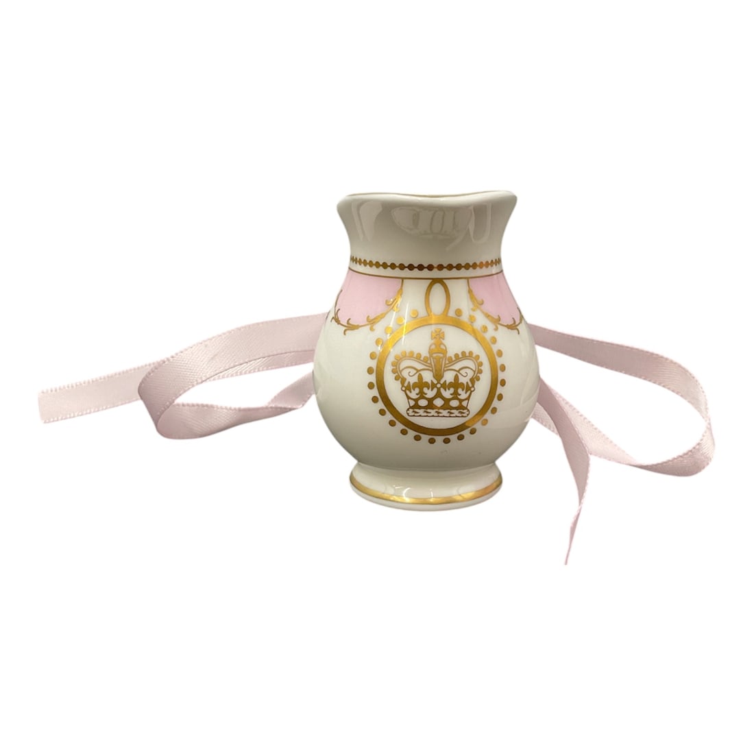 Buckingham Palace English Fine Bone China Miniature Jug: Delightful miniature bone china jug produced for Buckingham Palace, featuring an elegant white ground accented with soft pink bands and gilt decoration. The body is adorned with a crowned emblem withi
