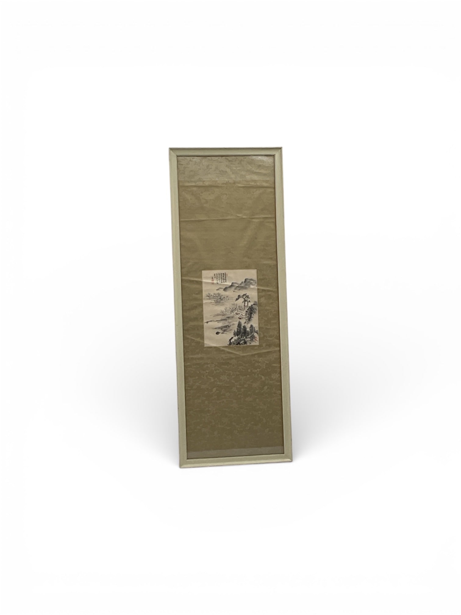 Framed East Asian Ink Landscape with Calligraphy – Vertical Composition: Elegant framed East Asian ink landscape artwork featuring a serene mountainous scene with water, foliage, and traditional brushwork, accompanied by vertical calligraphy and red seal marks. Executed in