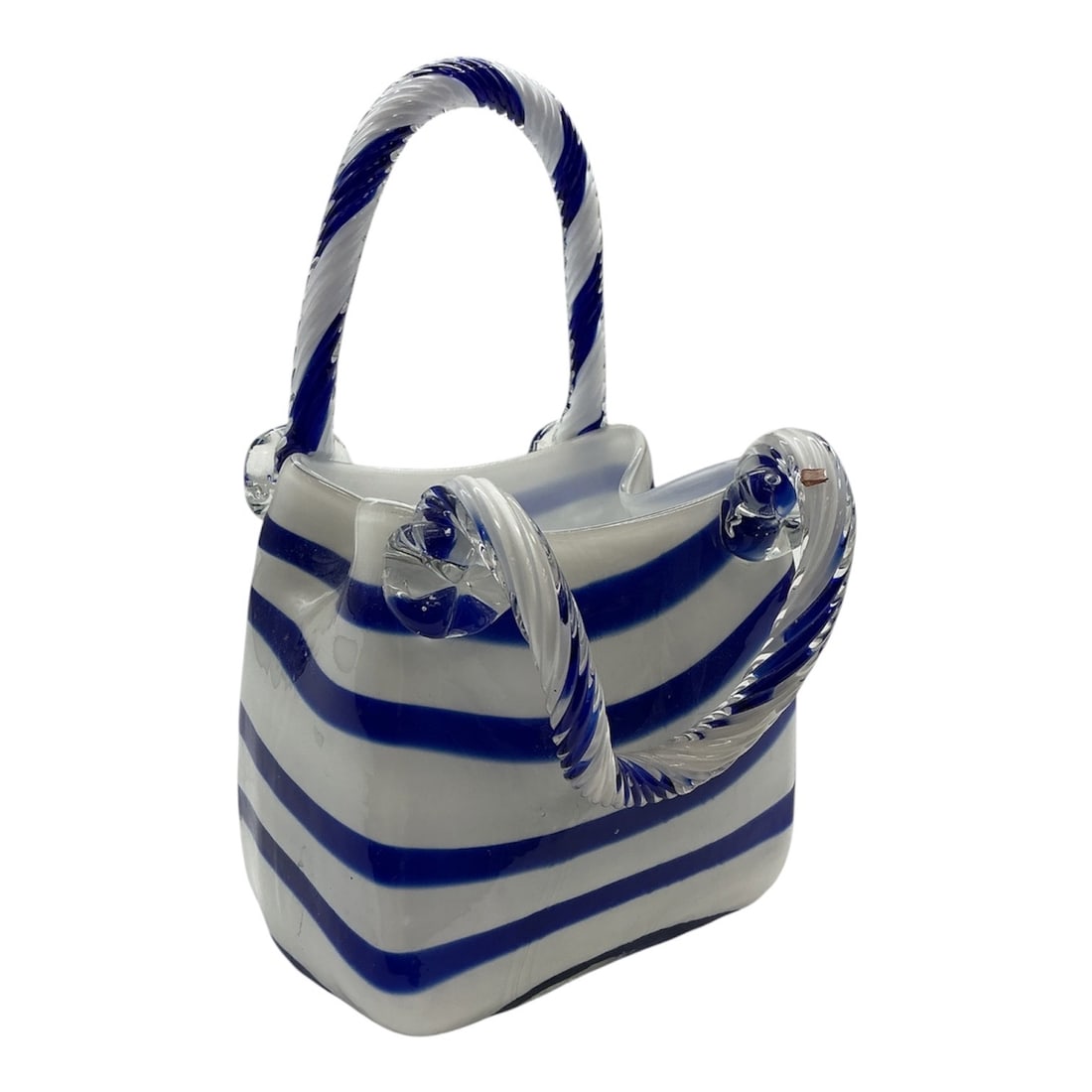 Blue and White Art Glass Handbag Form Vase: A decorative art glass basket featuring an opaque white body with bold cobalt blue horizontal striping. The form is shaped with softly pinched sides and an open top, complemented