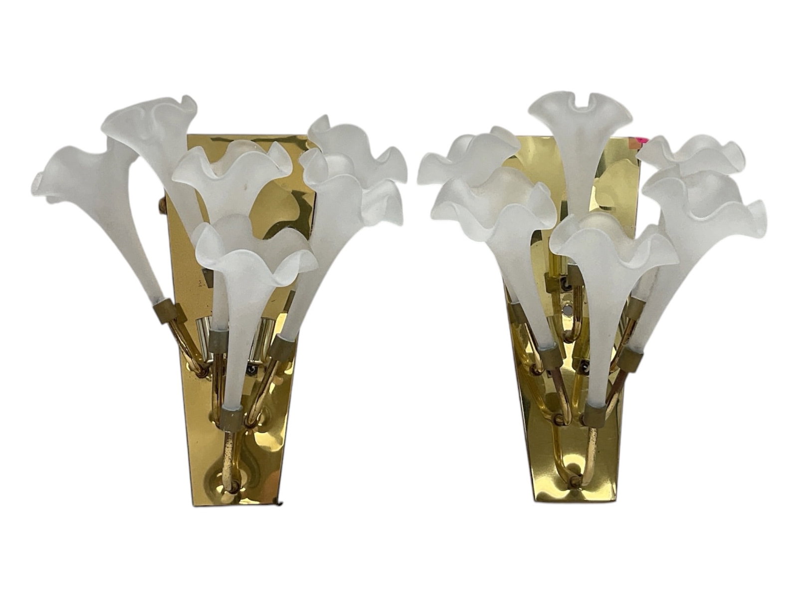Pair of Brass and Frosted Glass Floral Wall Sconces: A decorative pair of wall sconces featuring gilt-tone metal mounts fitted with multiple frosted glass shades in the form of blooming flowers or calla lilies. The sculptural arrangement creates an eleg