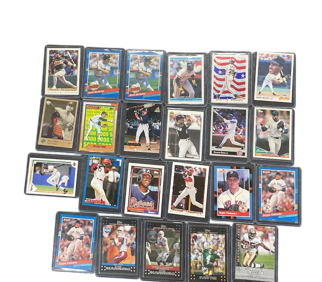 Group of 23 Assorted Baseball and Basketball Trading Cards: A collection of 23 assorted sports trading cards primarily featuring baseball players along with a few basketball cards. The group includes cards from various manufacturers and series, displaying a mi