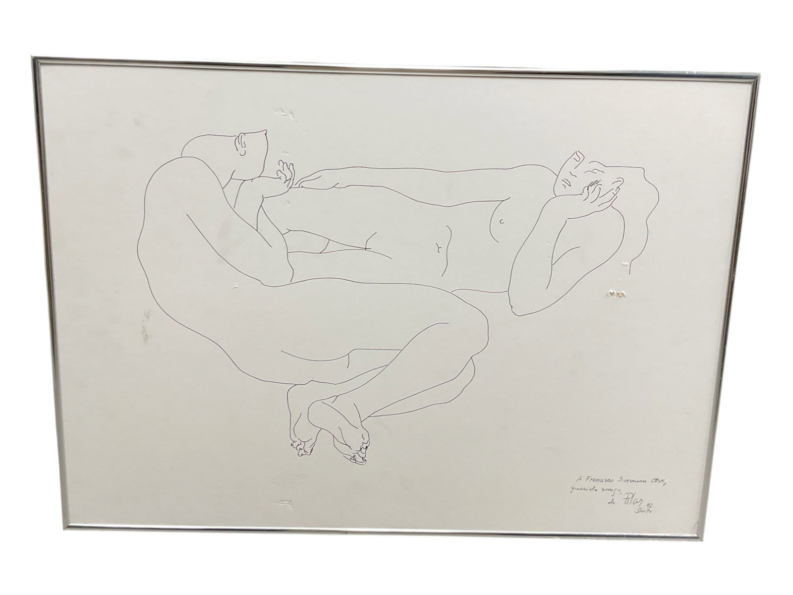 Pilar Bustos (Ecuador, b.1945) Ink Drawing: This minimalist line drawing by Ecuadorian artist Pilar Bustos captures the delicate form of a reclining nude figure. The simplicity of the continuous line technique highlights the natural curves and 