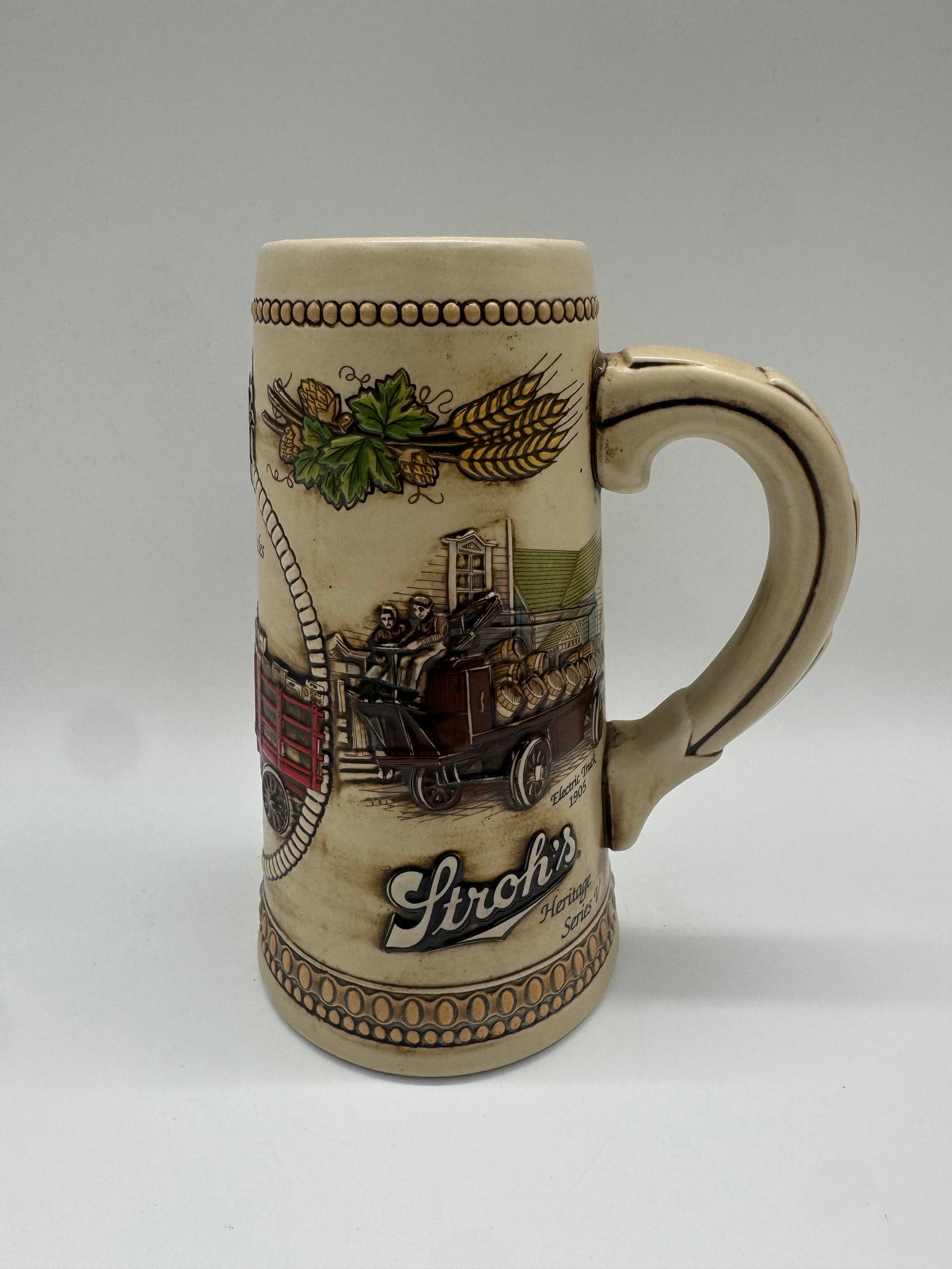Stroh’s Beer Horse-Drawn Wagon Stein, Vintage Ceramic Advertising Stein: Vintage Stroh’s beer advertising stein with cream-colored ceramic body and detailed wraparound scene of a horse-drawn St