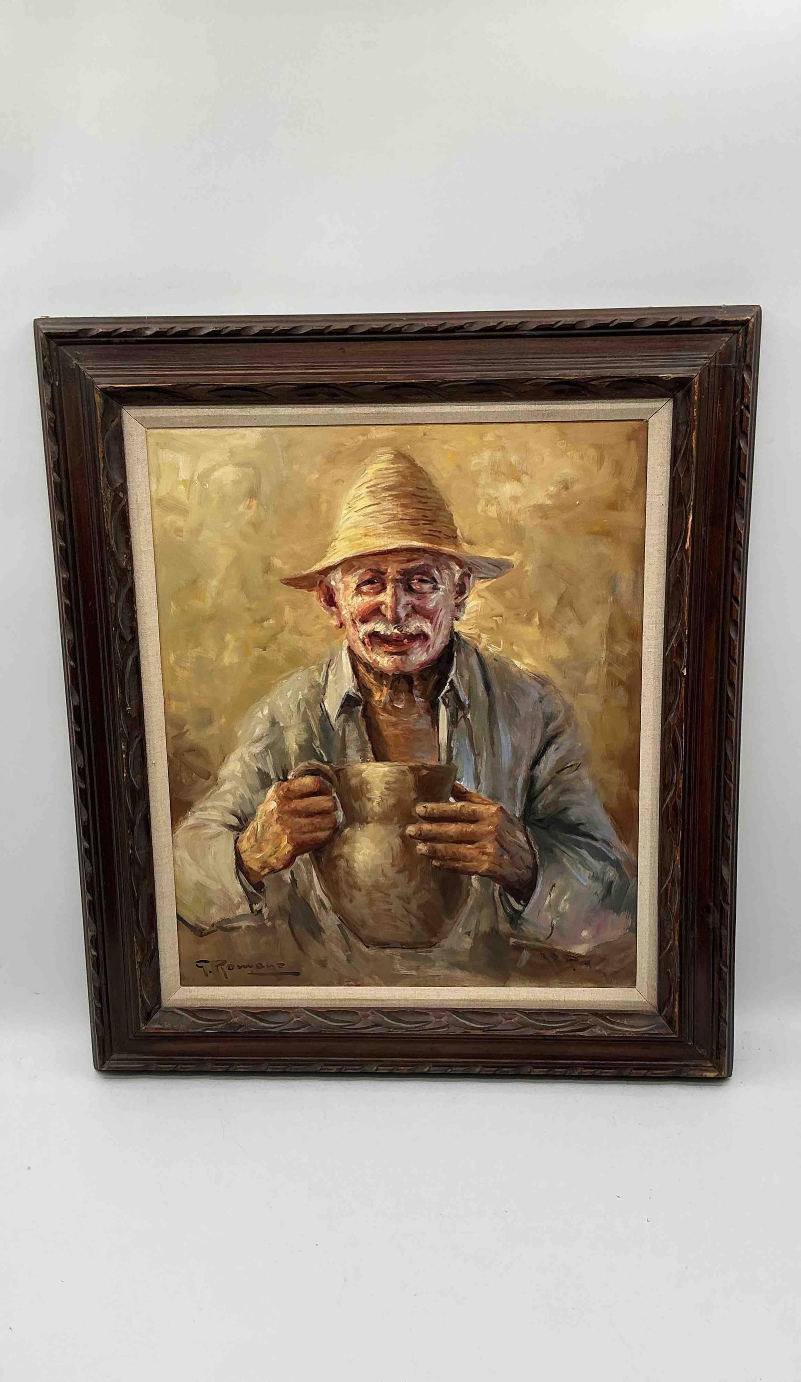 G. Romano Oil Painting – Elderly Man with Jug: Description: Expressive oil on canvas painting by G. Romano depicting an elderly man in a straw hat, holding a large clay jug and smiling warmly. Executed in a textured, impasto style with earthy tone