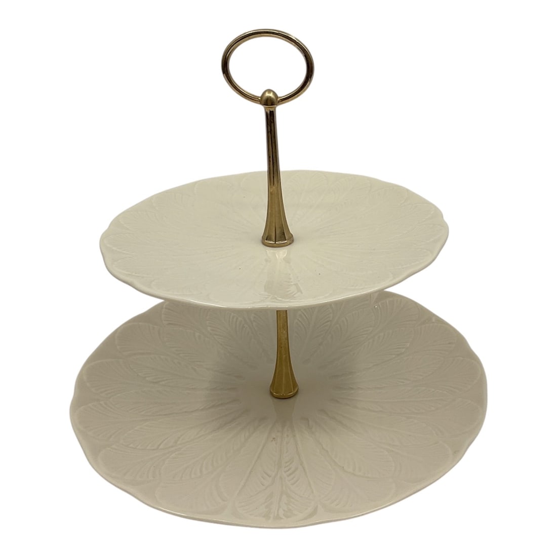 Lenox Porcelain Two-Tier Serving Stand: A Lenox porcelain two-tier serving stand featuring round plates with an embossed leaf pattern and a glossy light-toned glaze. The tiers are joined by a central metal rod with a ring handle, making it 