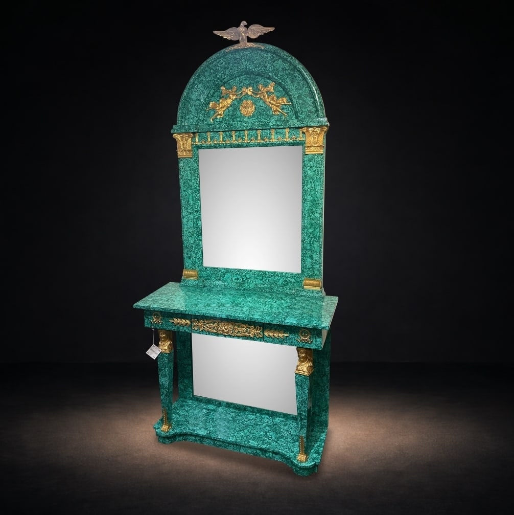 MC129 Malachite Veneer and Dore Bronze Mounted Console with Mirror in the Empire Taste: An extraordinary and highly decorative console with integrated mirror, crafted in the grand Empire style and featuring a rich malachite veneer throughout, complemented by finely cast dore bronze mount