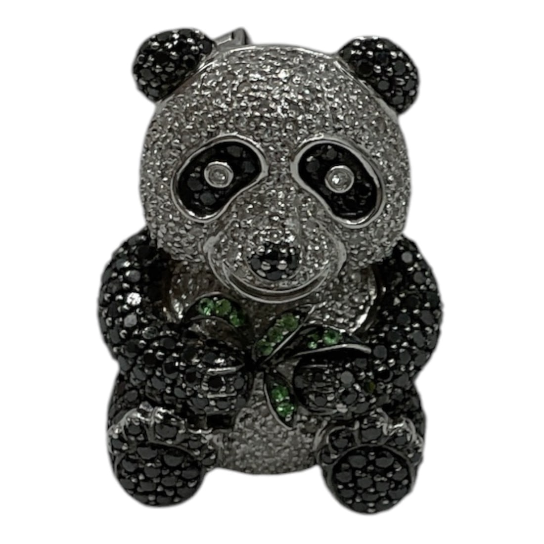 Black and White Diamond Panda Brooch Pendant Necklace: A whimsical and luxurious panda-form brooch pendant adorned with black and white pavé-set stones throughout. The seated panda holds green stone bamboo accents, with contrasting dark and bright 