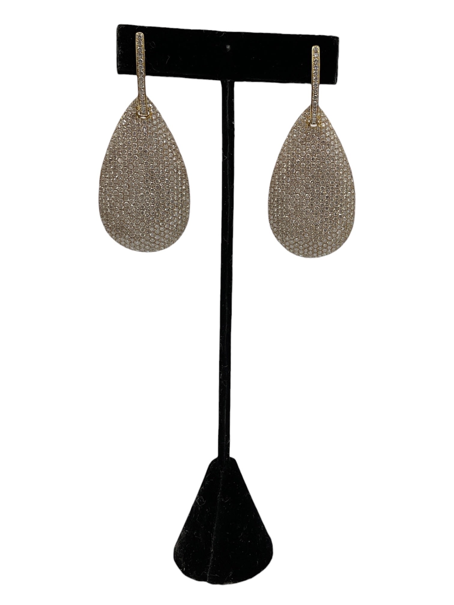 Pair of Yellow Gold Pavé Diamond Teardrop Earrings: An elegant pair of elongated teardrop earrings featuring pavé-set natural diamonds across the entire surface for exceptional brilliance and sparkle. The dramatic open teardrop silhouette is sus