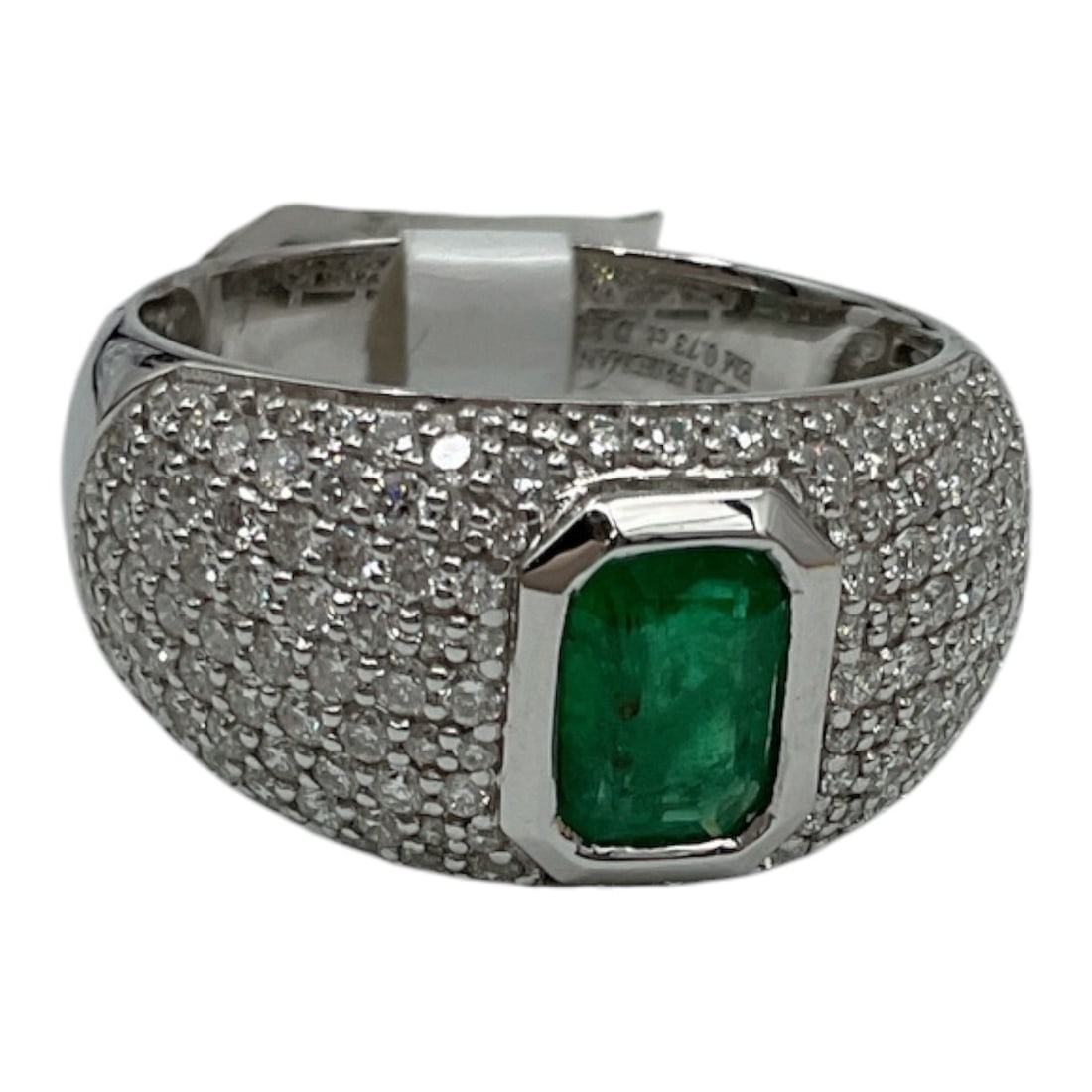 Oscar Friedman 18K White Gold Emerald and Diamond Ring with GIA Appraisal: A bold and luxurious ring by Oscar Friedman, crafted in 18K white gold and set with a vibrant emerald-cut green emerald at center. The centerpiece is surrounded by a wide pavé-set field of roun