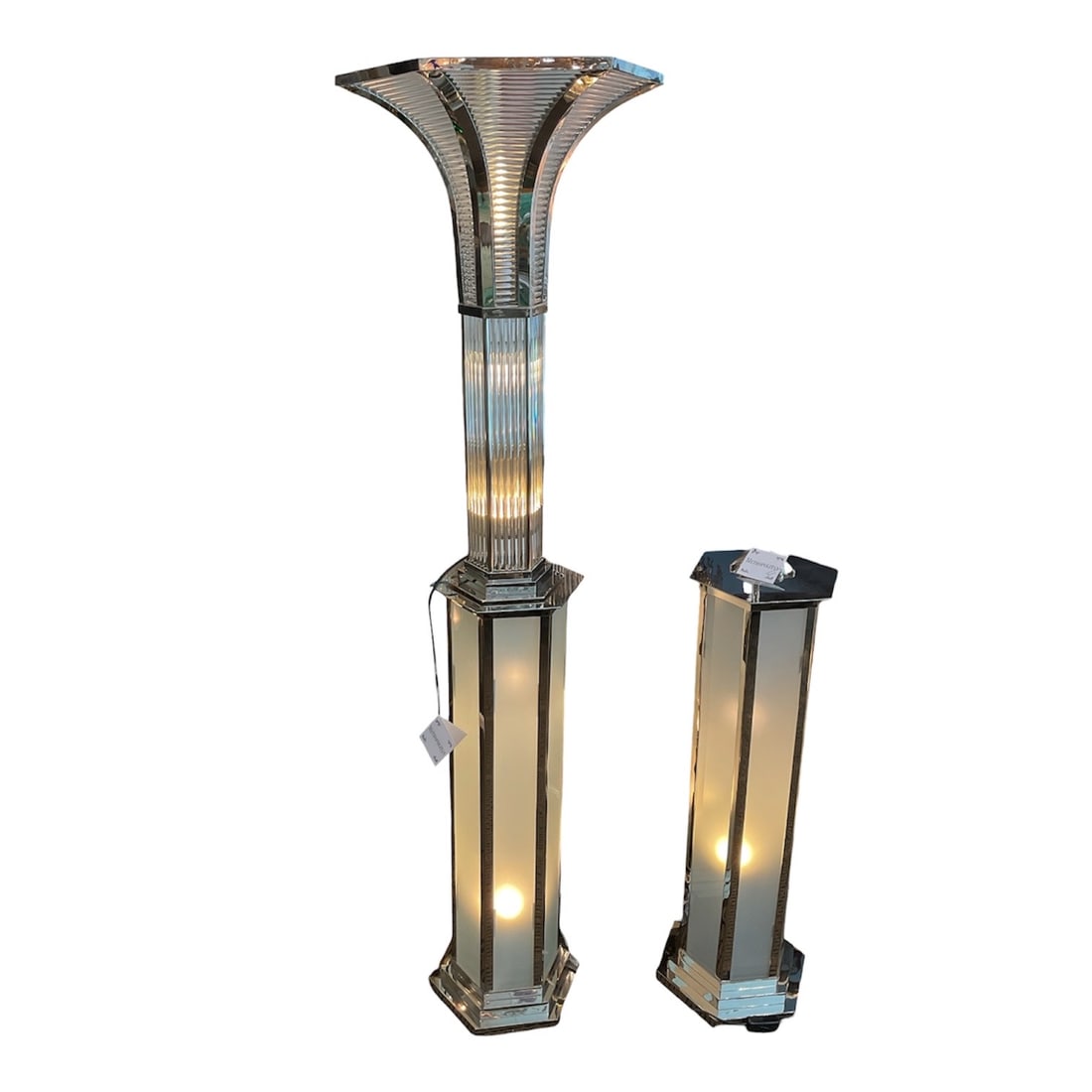 LM048 - Pair of Art Deco Frosted Crystal and Chrome Floor Lamps: A bold and architectural pair of Art Deco floor lamps, showcasing a striking combination of frosted crystal elements and polished chrome construction. These sculptural lighting pieces exemplify the st