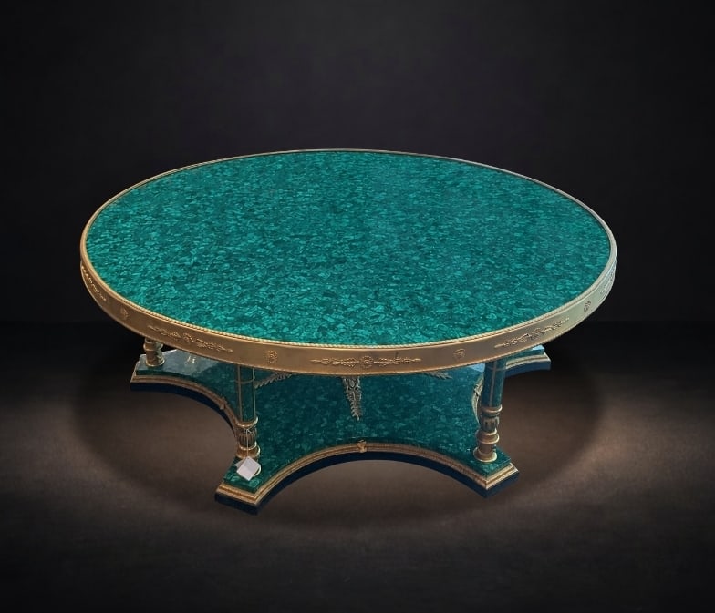 MC204 - Malachite and Dore Bronze Round Center Table: A striking and luxurious round center table, crafted in richly patterned malachite and adorned with finely cast dore bronze mounts. This impressive piece reflects the opulence and grandeur associated 