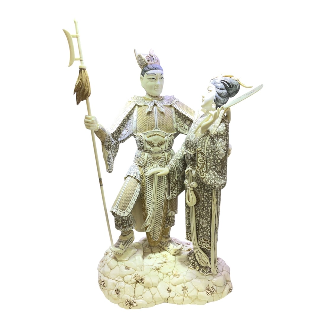 IC1288 - Carved Asian Figural Group of Warrior and Court Lady: A finely detailed carved figural group depictin