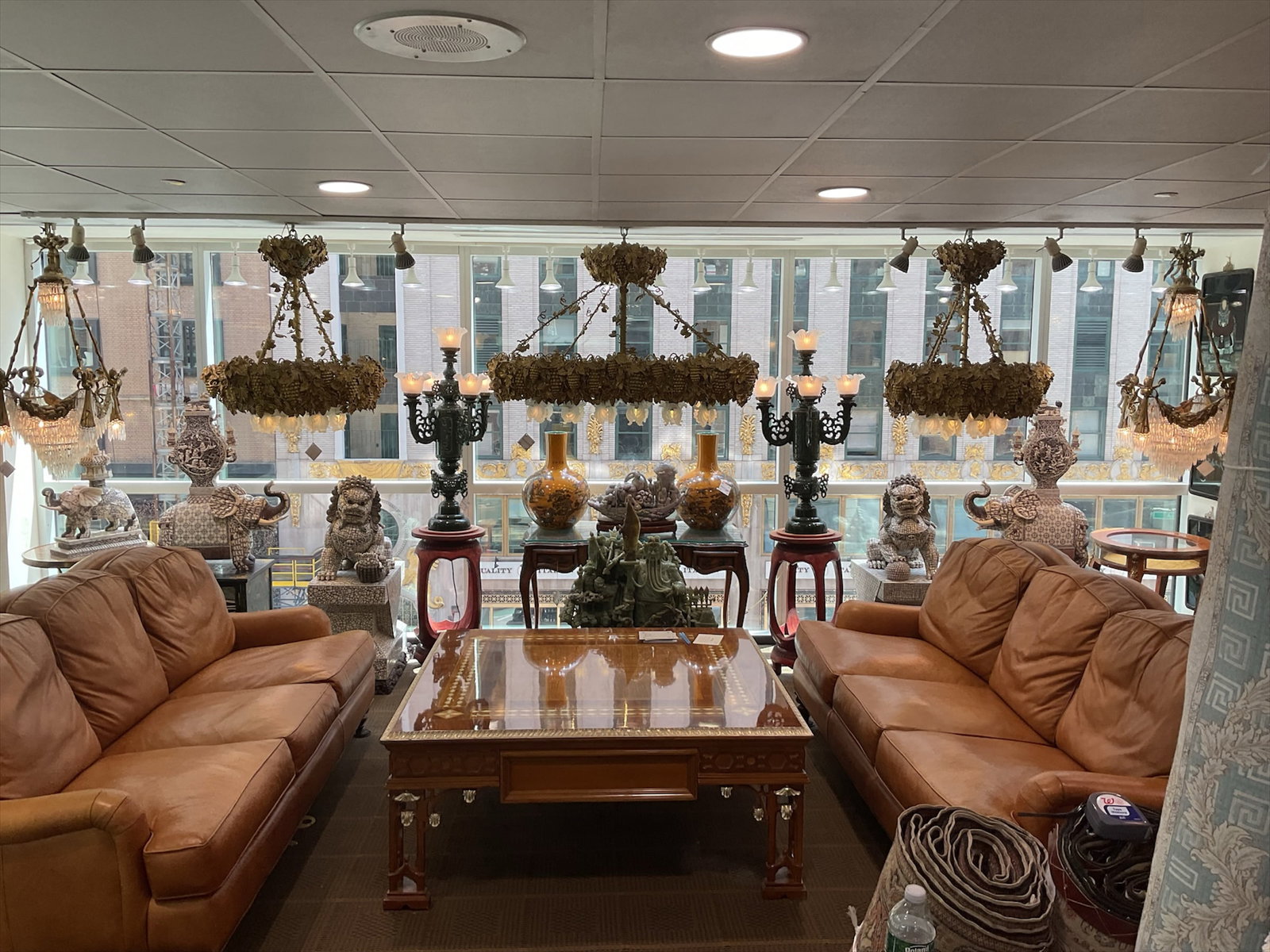 CH196 - Dore Bronze Grape Motif Chandelier: An elaborate dore bronze chandelier featuring a richly sculptural design of intertwined grapevines, clusters of grapes, and broad leaves, creating a naturalistic and highly decorative form. This
