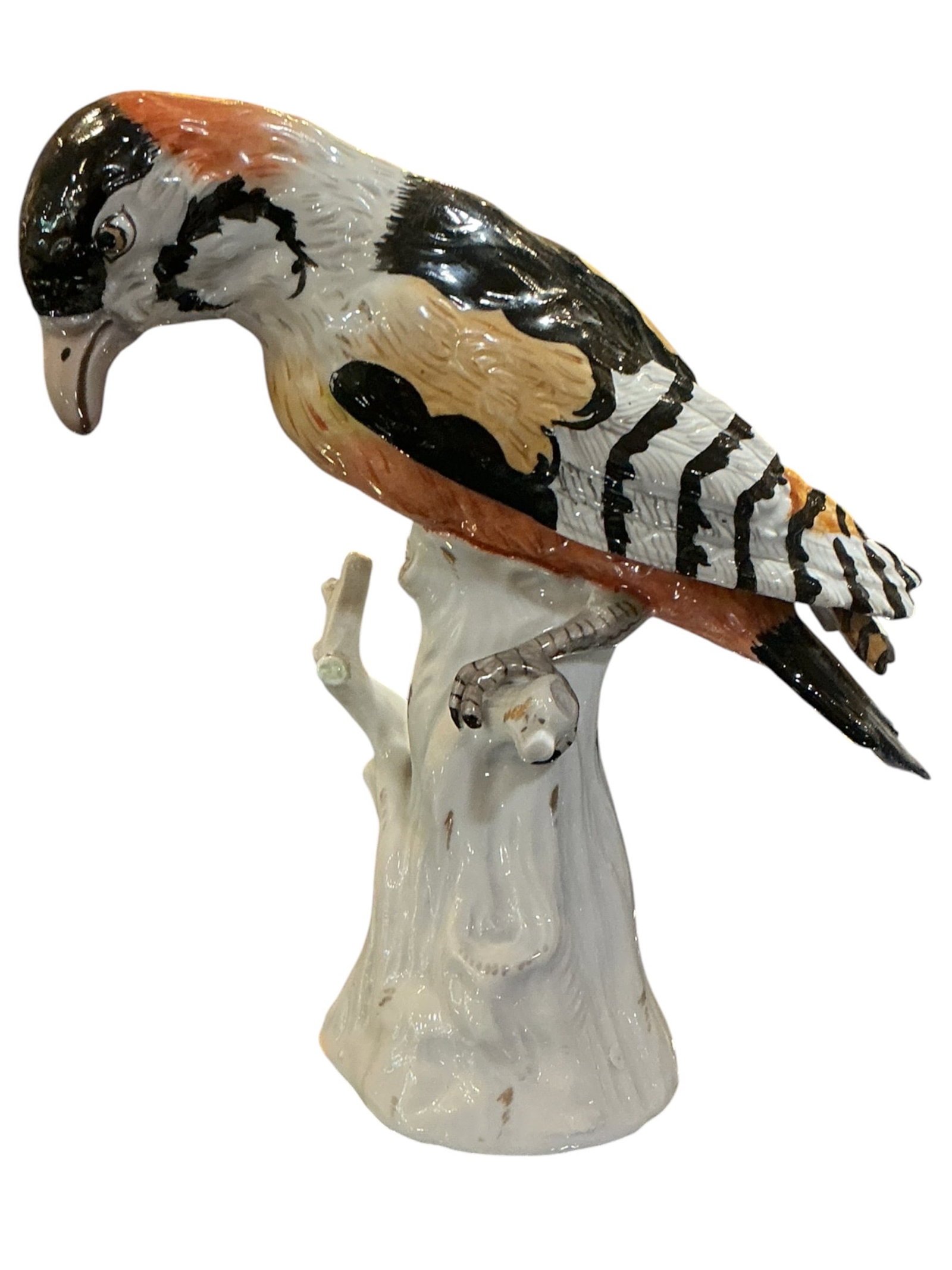 - Rosenthal Bird on Perch Porcelain Figure: A finely modeled porcelain figure of a bird per