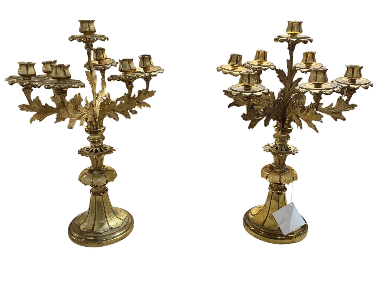 AQ289- Pair of 19th Century French Dore Bronze Candelabra: An elegant pair of 19th century French candelabra crafted in finely cast dore bronze, exemplifying the ornate and decorative style associated with period French craftsmanship. Each candelabrum