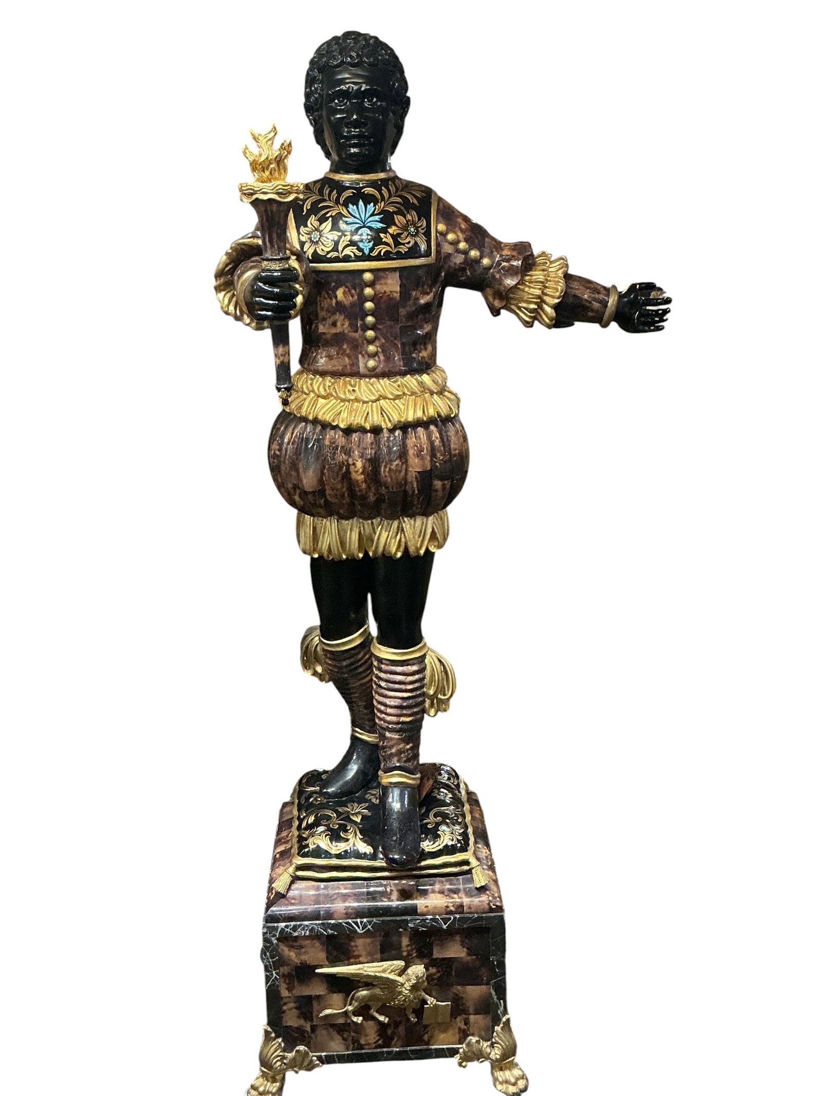 PC669- Pair of Polychrome and Shell Inlaid Blackamoor Figures: A highly decorative pair of Blackamoor figures, richly adorned with polychrome decoration and intricate shell inlay, presented in a traditional Venetian-inspired style. Each figure is depicted