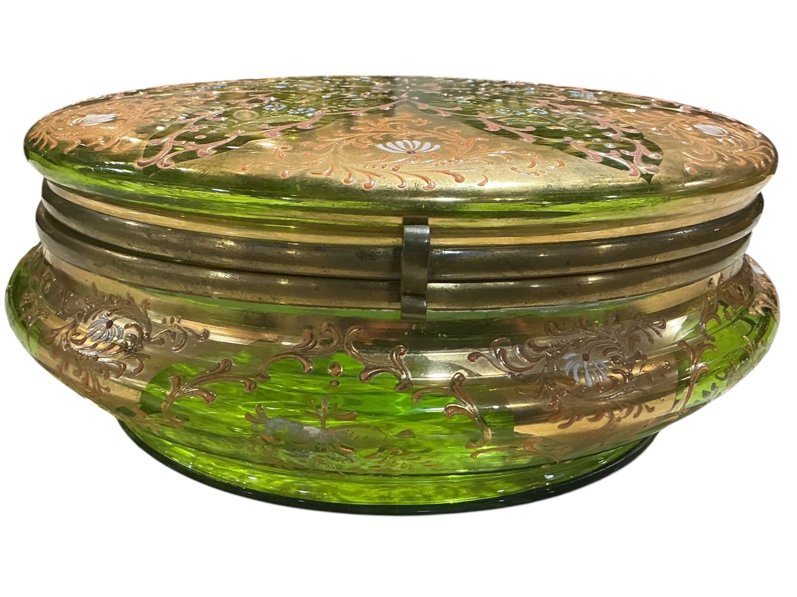AQ478- 19th Century Moser Green Glass Covered Box: A finely executed 19th century covered box attributed to Moser, crafted in vibrant green glass and richly decorated with intricate gilt ornamentation. The circular form is elegantly proportioned, with