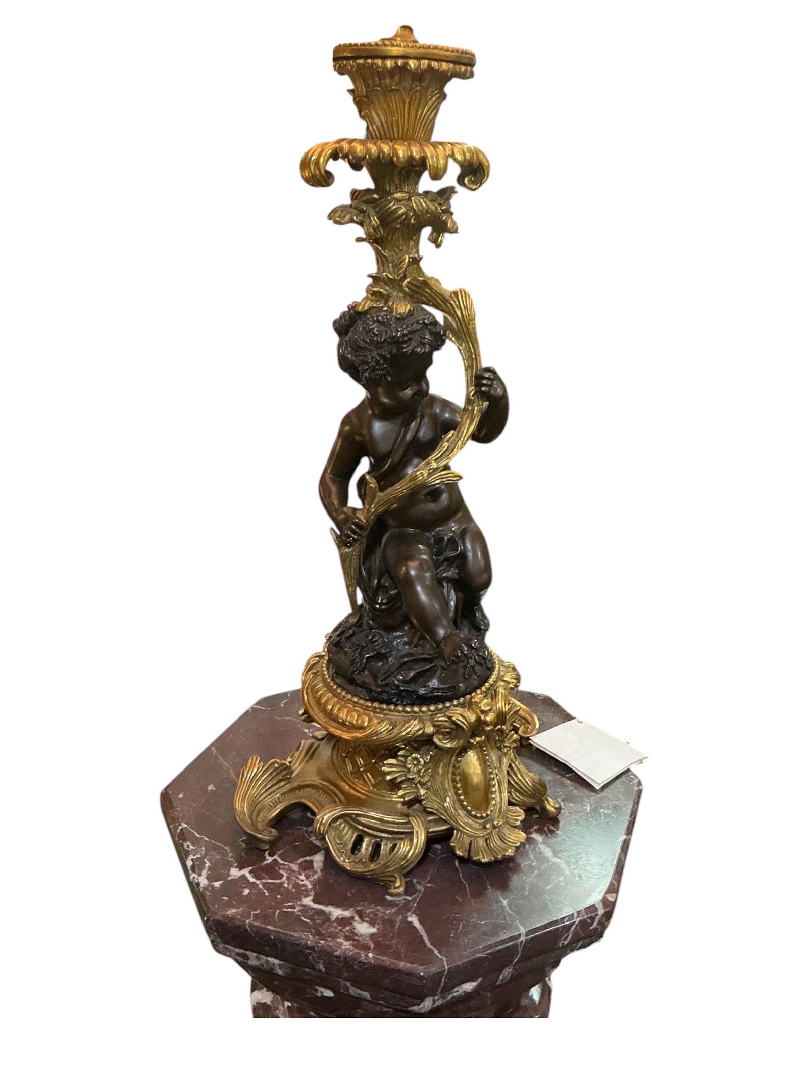 ____? - Pair of Bronze Cherub Form Table Lamps with Shades: An elegant pair of table lamps featuring fine