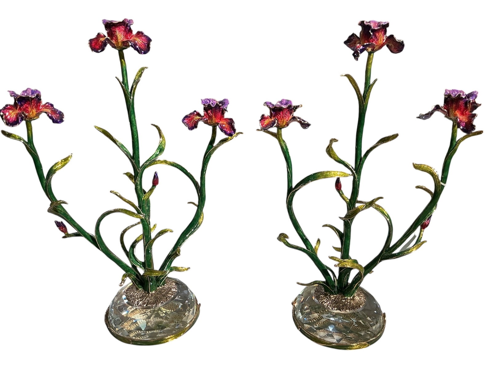 CS659- Pair of Crystal and Enamel Three-Light Candelabra: A beautifully executed pair of three-light candelabra crafted in crystal and richly decorated with enamel in a naturalistic floral motif. Each piece features gracefully rising stems formed as intertwi