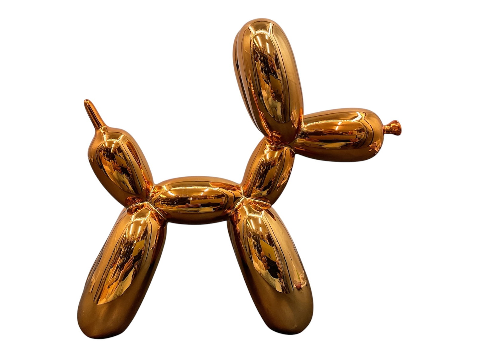 Contemporary Balloon Dog Style Copper Finish Sculpture: Contemporary decorative sculpture modeled after a balloon animal dog with a highly reflective copper-tone metallic finish. The stylized form is composed of elongated balloon-like segments in the manne