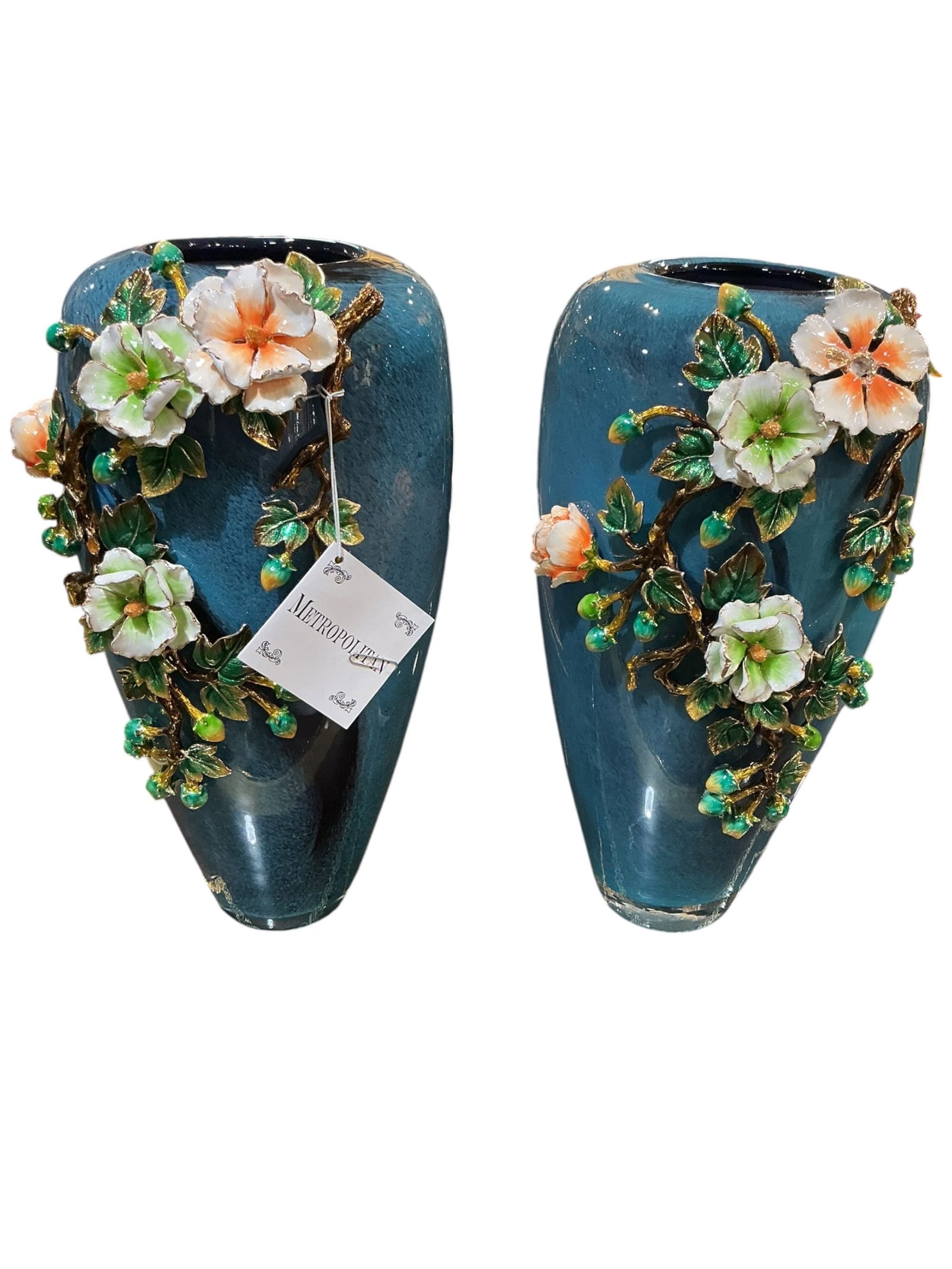CS1050- Pair of Blue Crystal and Enamel Mounted Vases with Floral Decoration: A striking pair of large blue crystal vases adorned with elaborate enamel floral decoration, executed in a richly decorative European style. Each vase features a tapered form with a smooth, flowing si