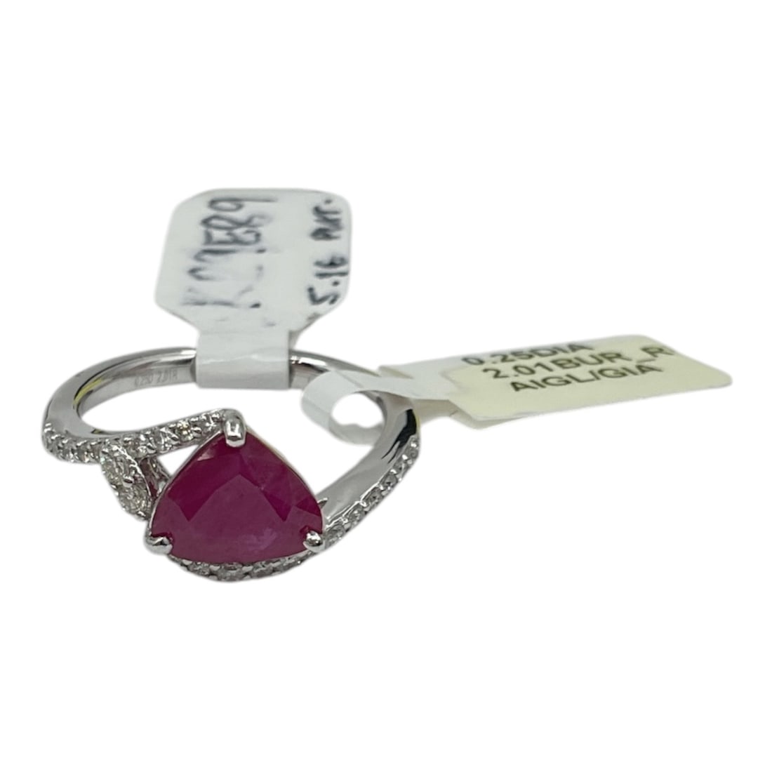14K White Gold Ruby and Diamond Ring with GIA & AIGL Reports: A refined ring crafted in 14K white gold, featuring a heart-shaped ruby at center. The vivid red gemstone is set within a graceful bypass-style band accented with round brilliant cut diamonds, adding 